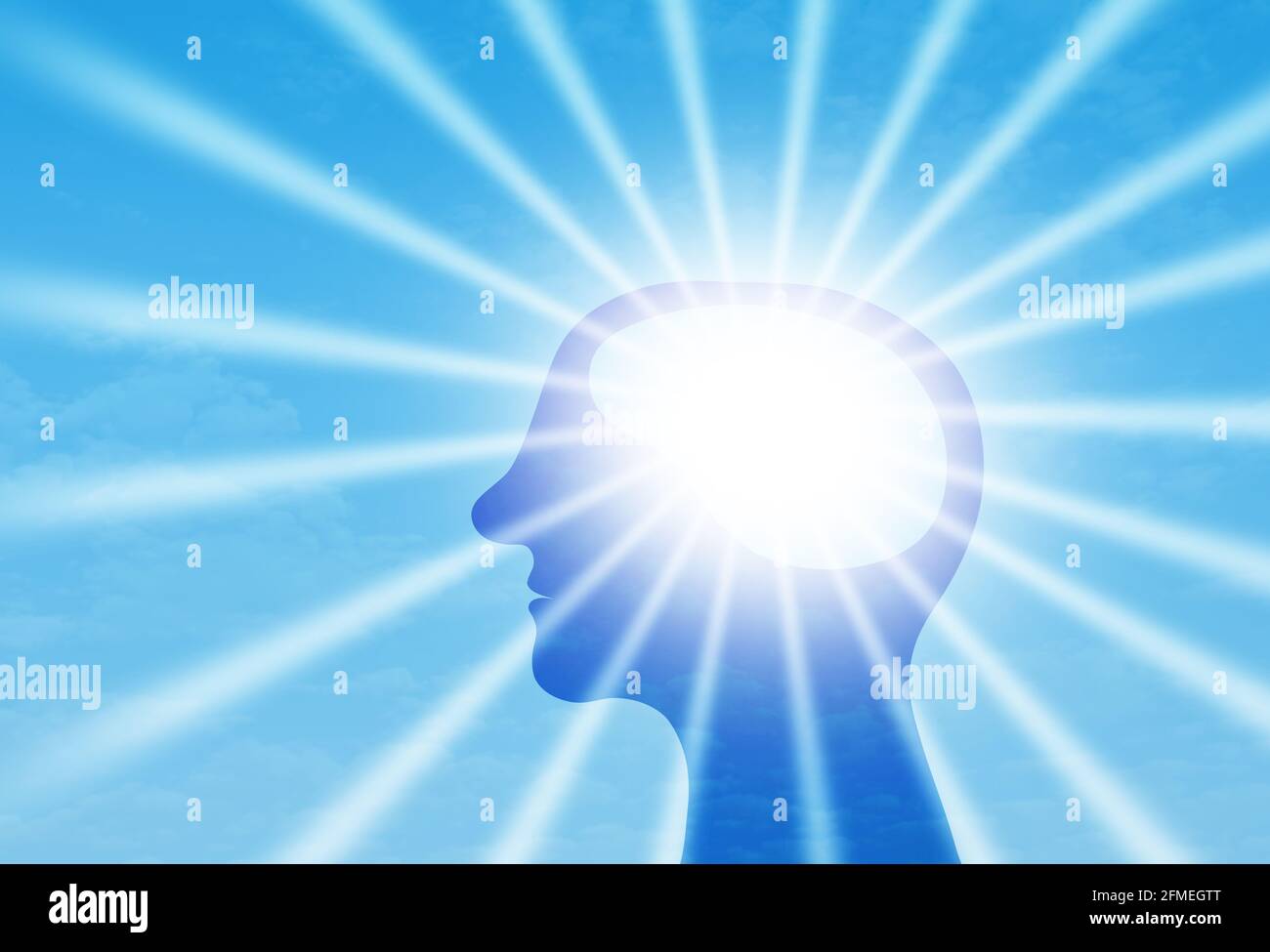 Sonnenstrahlen leuchten vom menschlichen Kopf, von Energie und Kraft des Geistes, von positivem Denken und Gefühl und von mentaler Gesundheit Stockfoto