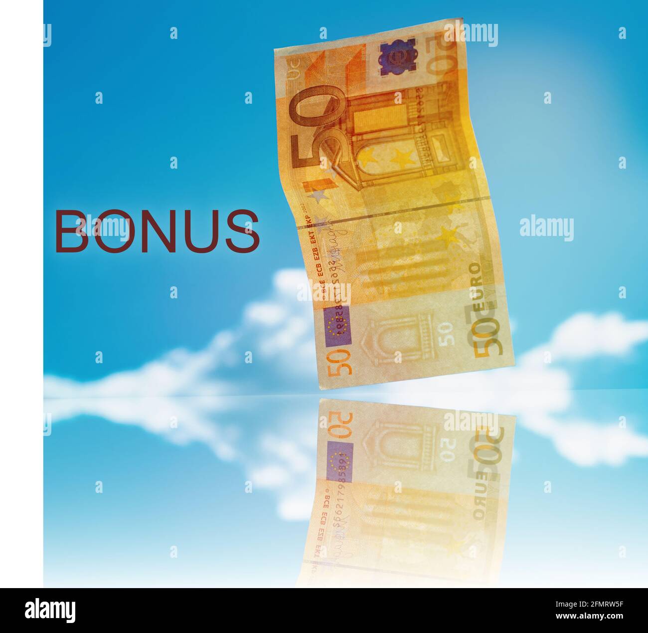 Eine Banknote von 50 Euro fliegt in den Himmel mit Der Text „Bonus“ Stockfoto