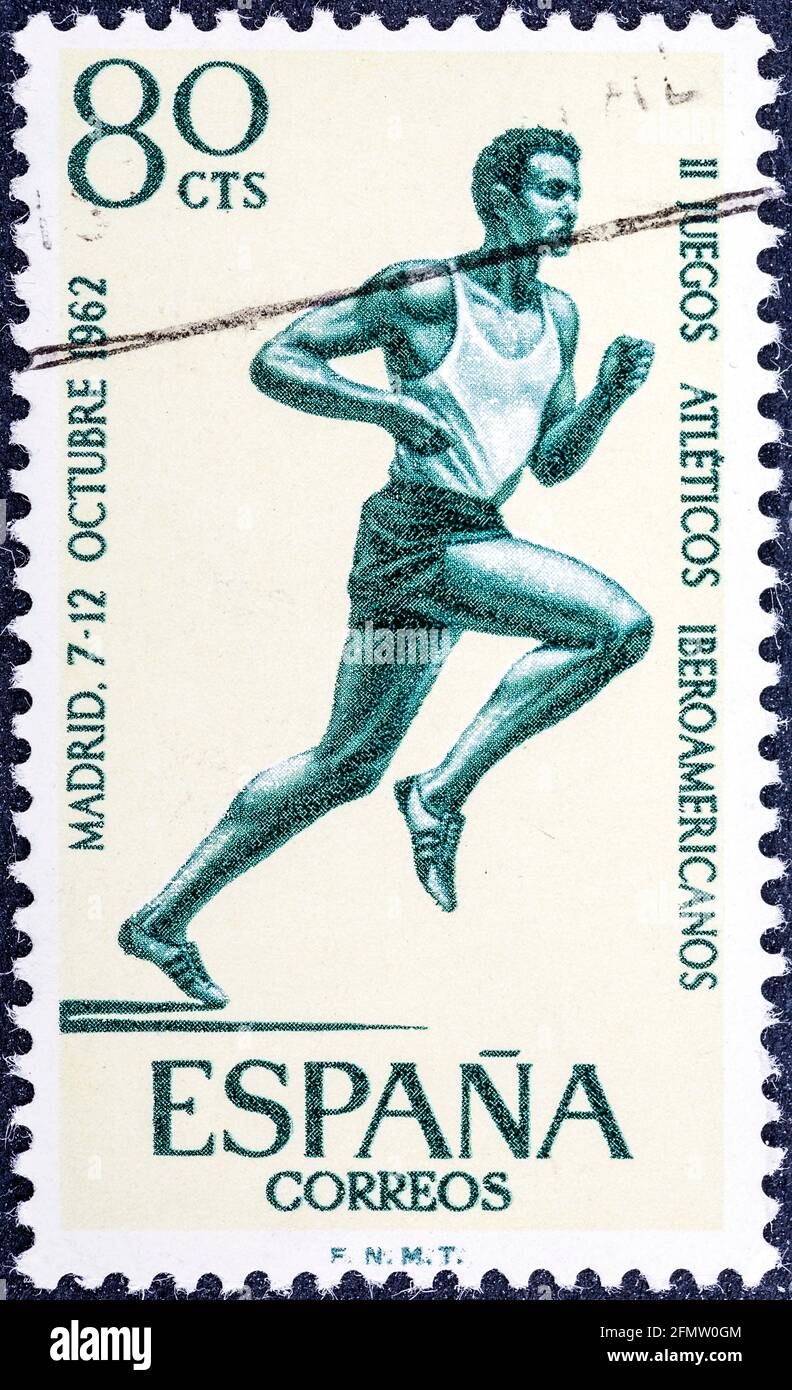 SPANIEN - UM 1962: Briefmarke gedruckt von Spanien, zeigt Läufer bei Iberoamerikanischen Sportspielen, um 1962 Stockfoto