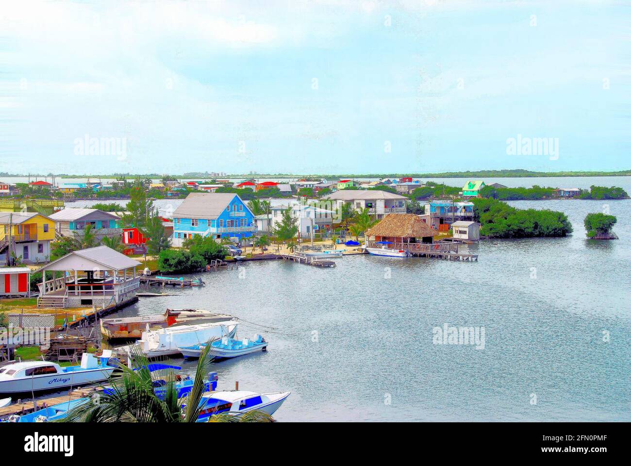 Viele Häuser mit Booten werden in der Nähe des Karibischen Meeres im südlichen Teil von Ambergris Caye gebaut, Stockfoto