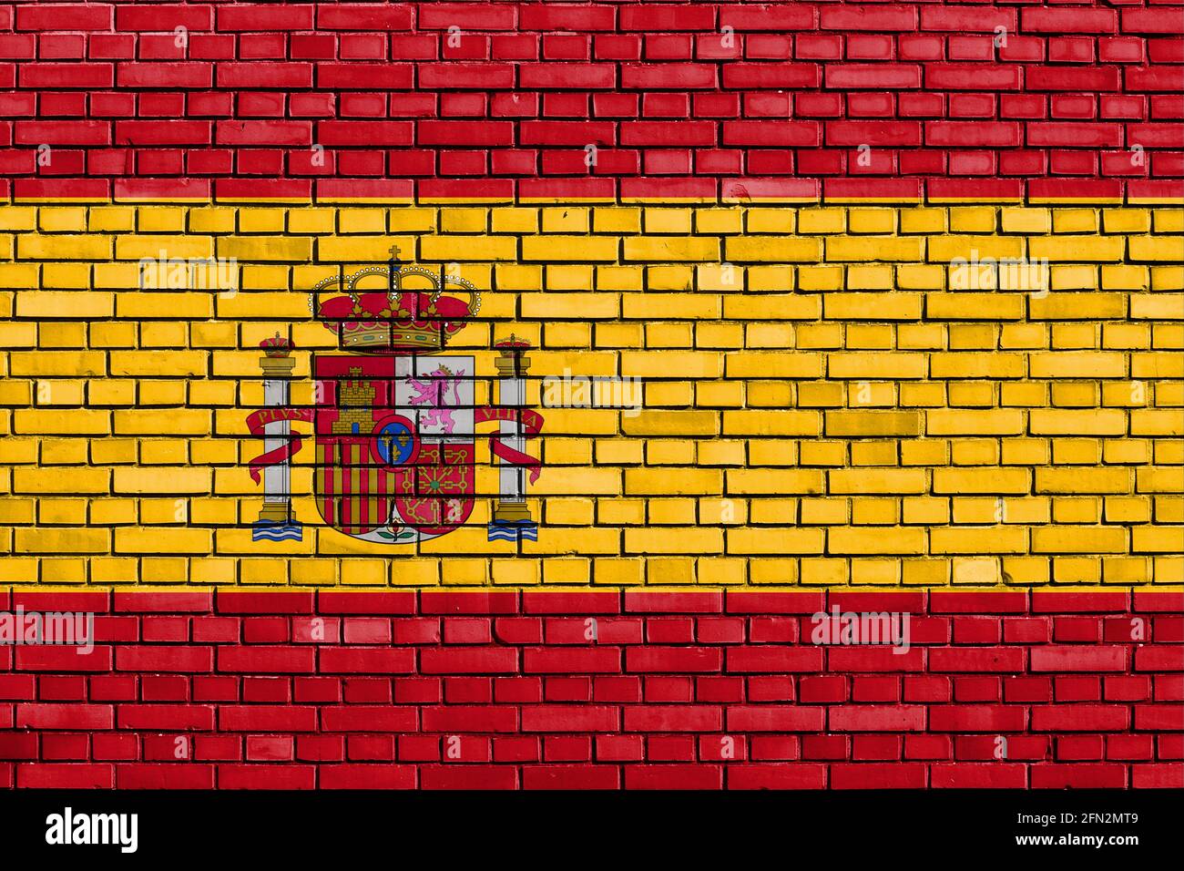 Flagge von Spanien auf Ziegelmauer gemalt Stockfoto