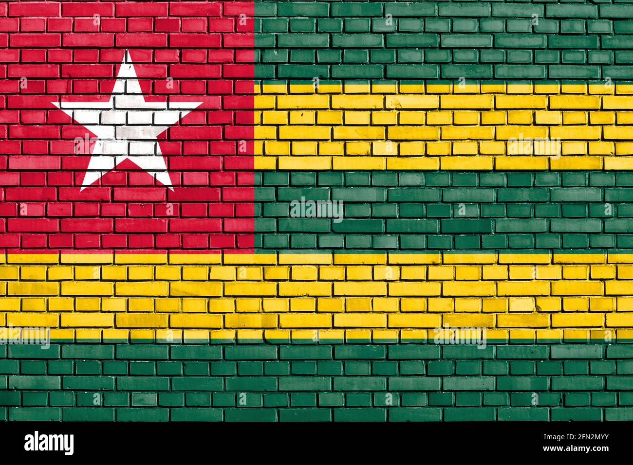 Flagge von Togo auf Mauer gemalt Stockfoto