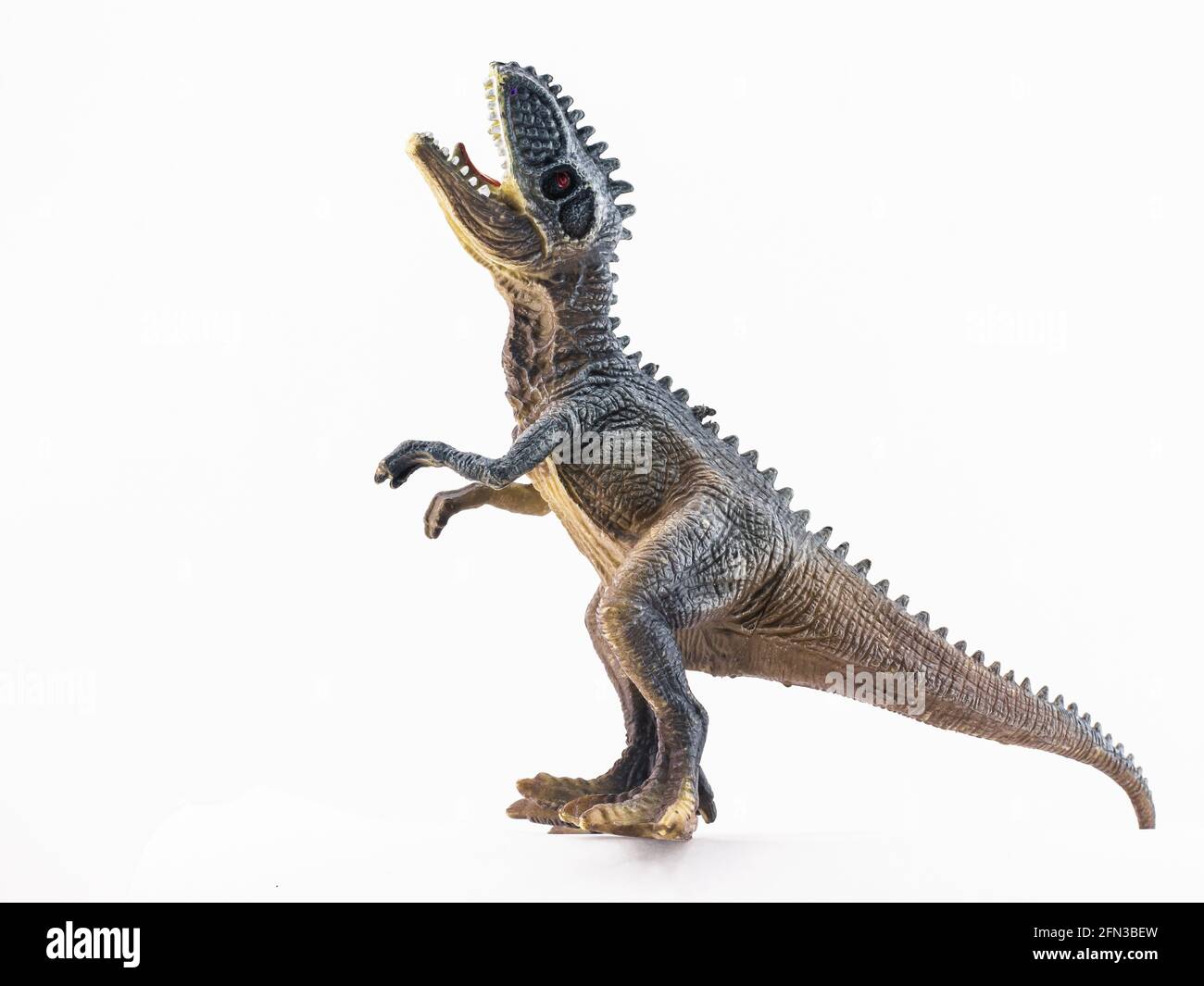 Kunststoff Spielzeug Dinosaurier isoliert auf weißem Hintergrund Stockfoto