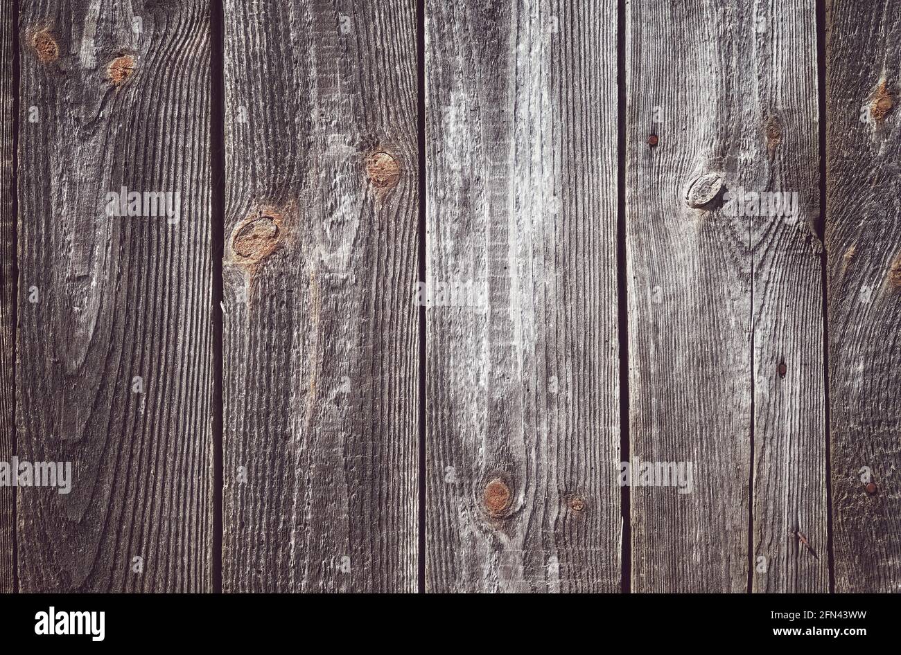 Bild einer alten rauen Holzbrettwand. Stockfoto