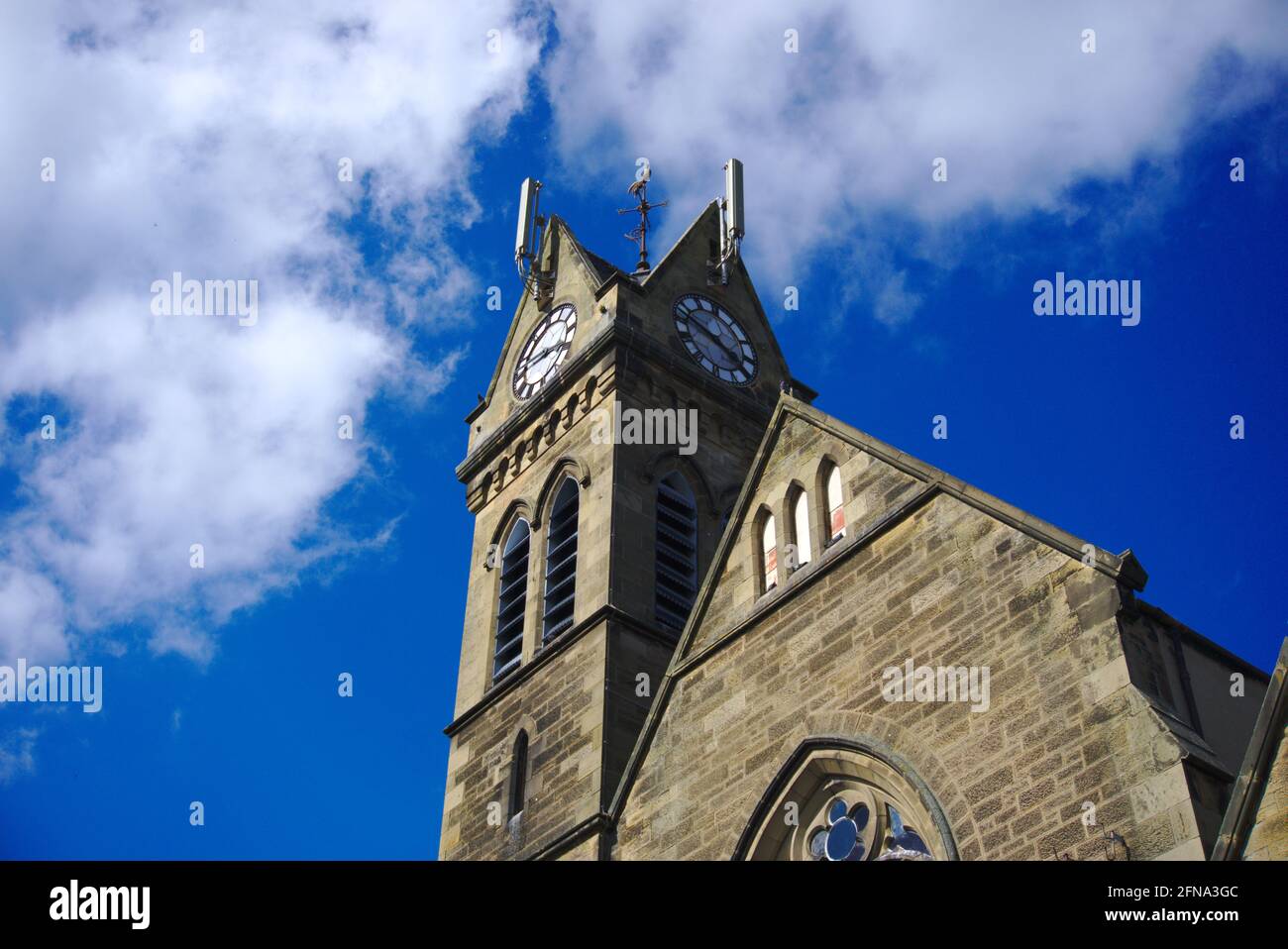 Uhrturm der ehemaligen Free Church (später Rodger Memorial Church, später Eildon Center) in Victoria Place, Coldstream, Berwickshire, Schottland Stockfoto