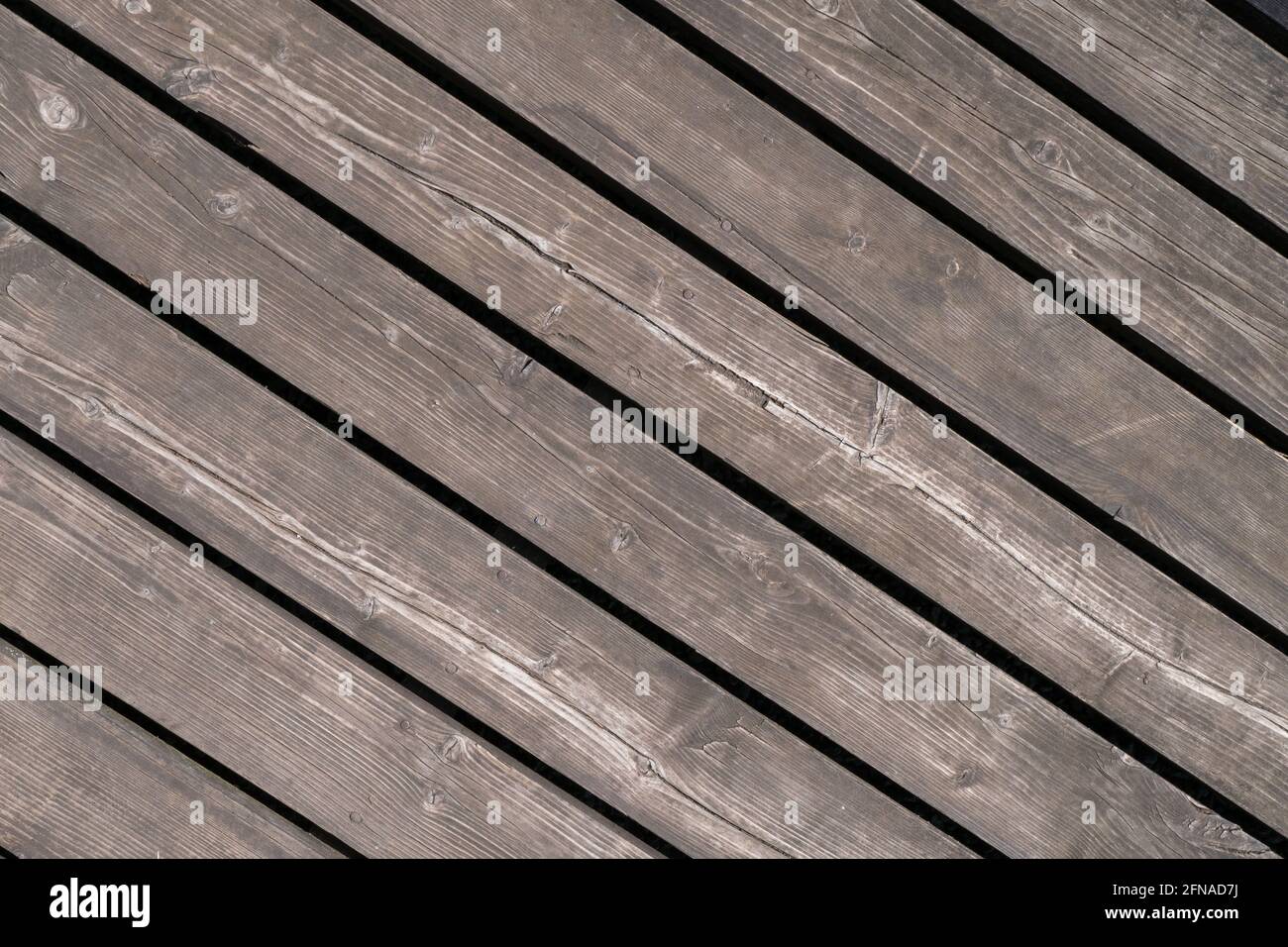Gewaschenes altes Holz Hintergrund, abstrakte Holzstruktur, auf dem verlassenen Bauernhof gegründet. Kann für Hintergrund- oder andere visuelle Inhalte verwendet werden. Stockfoto