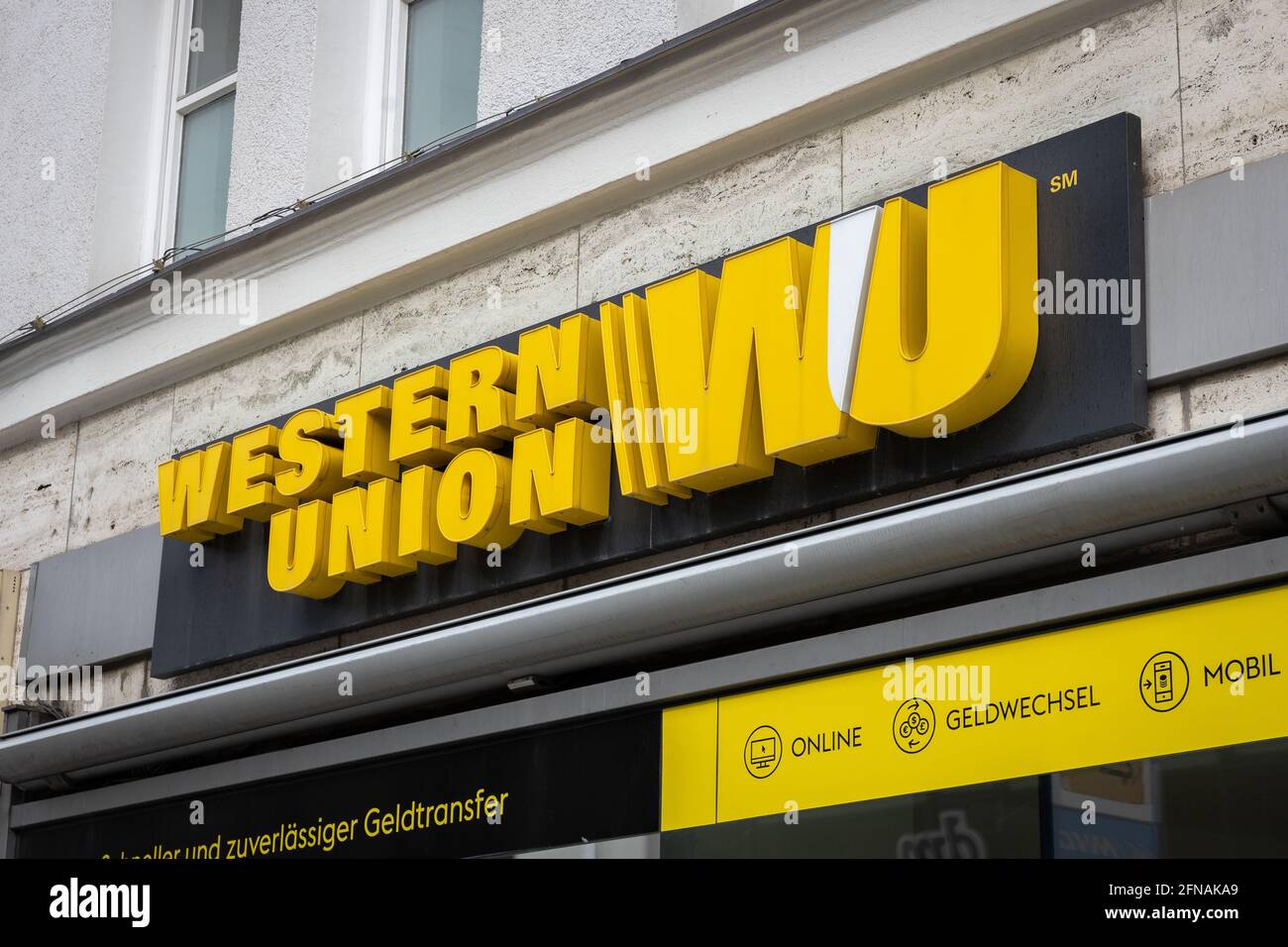 WESTERN Union Store-Schild im Stadtzentrum von München Stockfoto