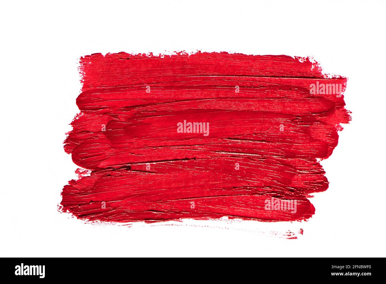 Roter Lippenstift auf weißem Hintergrund. Stockfoto