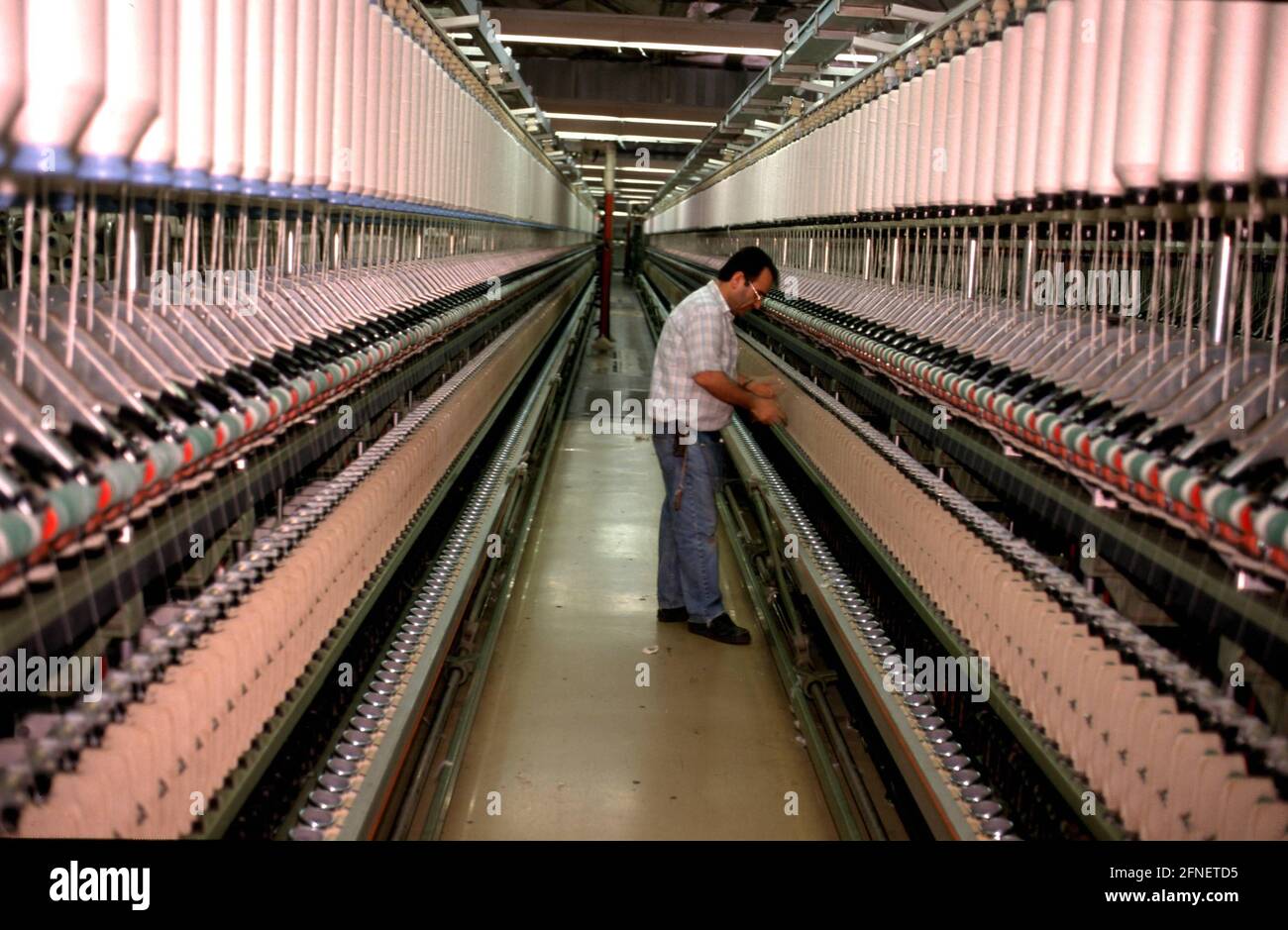 Herstellung von Garnen in einer Baumwollspinnerei in Gronau.n [Automatisierte Übersetzung] Stockfoto