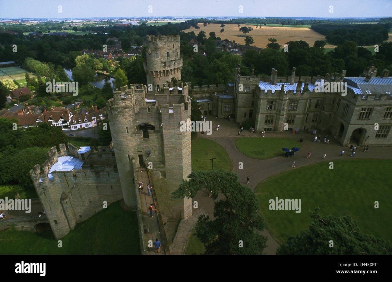 Das Schloss Warwick / Warwick Castle mit mittelalterlicher Folterkammer und einer Wachsfigurenausstellung von Madame Tussaud. [Automatisierte Übersetzung] Stockfoto