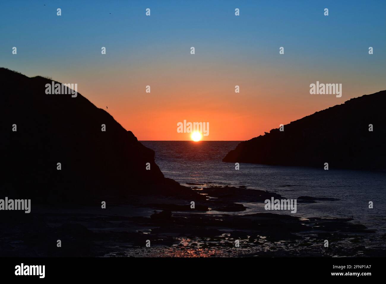 Port Quin Sonnenuntergang Stockfoto