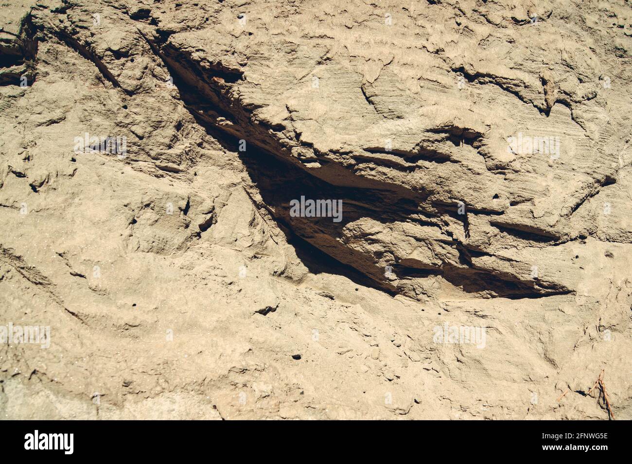 Die Textur des Sandes. Sandsteinbruch. Malerische Textur von Sandsteinen. Stockfoto