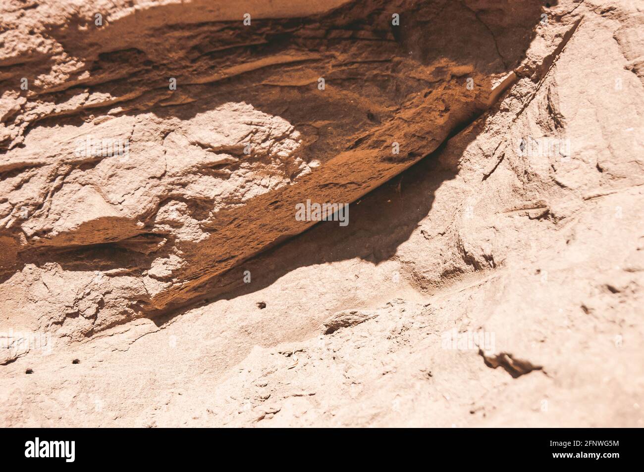 Die Textur des Sandes. Sandsteinbruch. Malerische Textur von Sandsteinen. Stockfoto