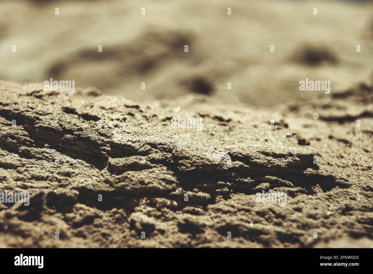 Die Textur des Sandes. Sandsteinbruch. Malerische Textur von Sandsteinen. Stockfoto