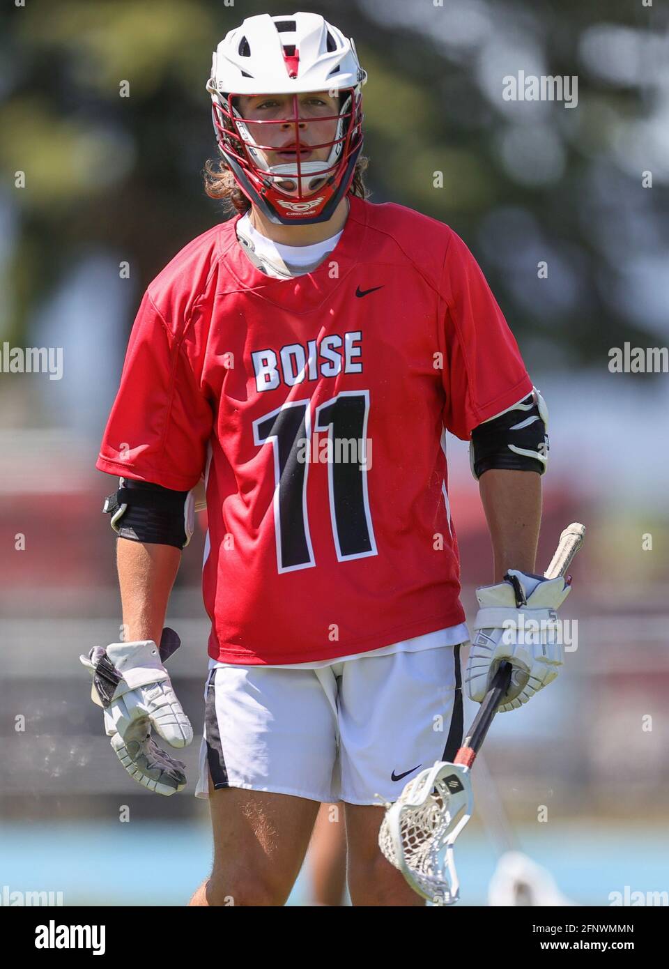 High School Lacrosse Action mit Boise vs Coeur d'Alene High School in Coeur d'Alene, Idaho. Stockfoto