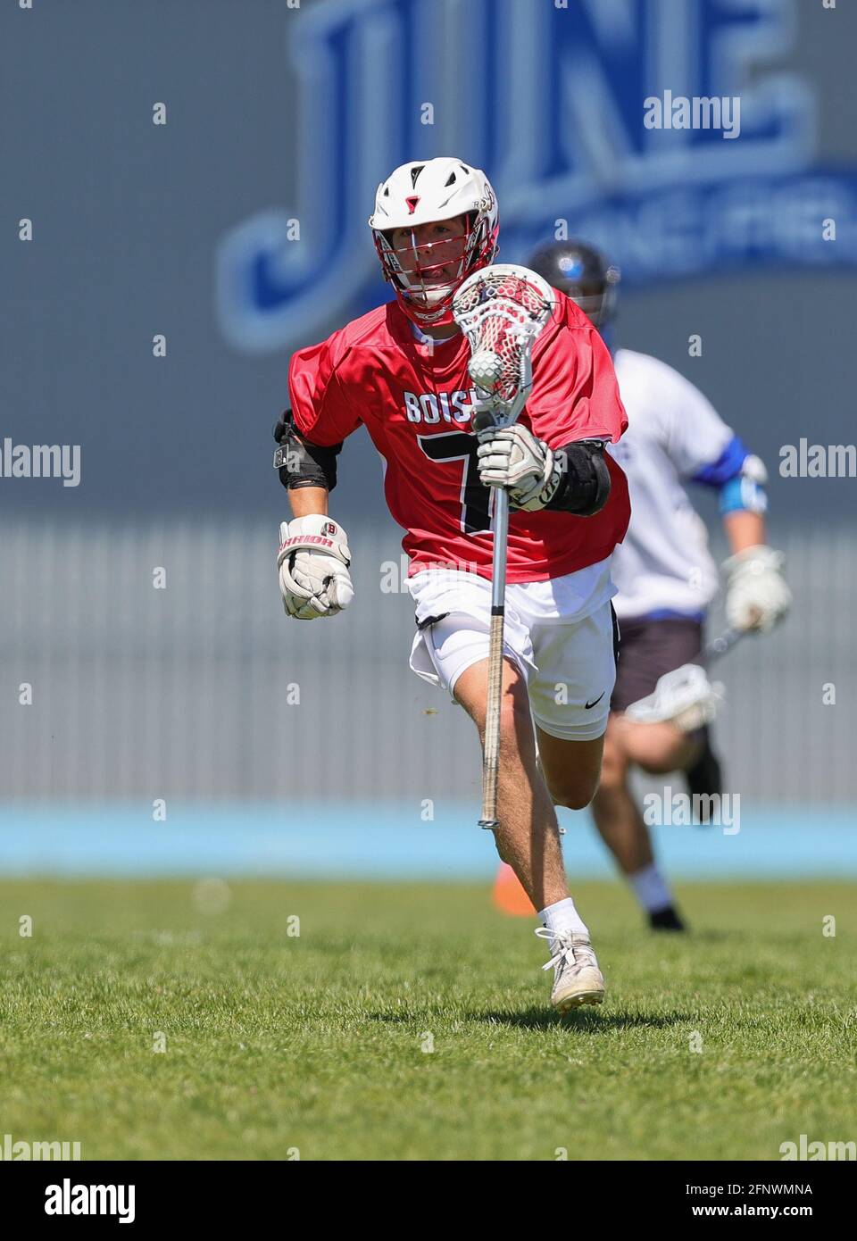 High School Lacrosse Action mit Boise vs Coeur d'Alene High School in Coeur d'Alene, Idaho. Stockfoto
