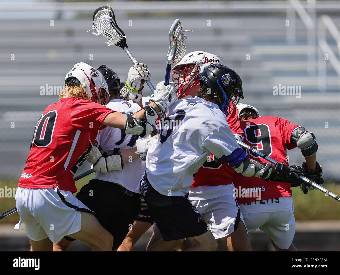 High School Lacrosse Action mit Boise vs Coeur d'Alene High School in Coeur d'Alene, Idaho. Stockfoto