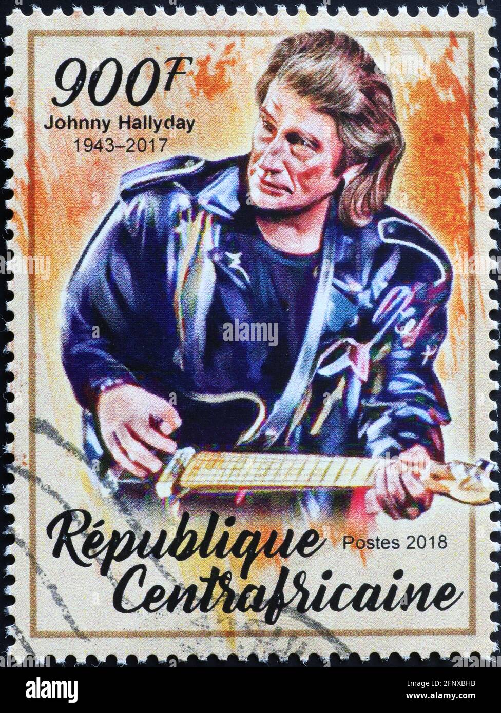 Johnny Hallyday, der die Gitarre auf einer Briefmarke schmackte Stockfoto