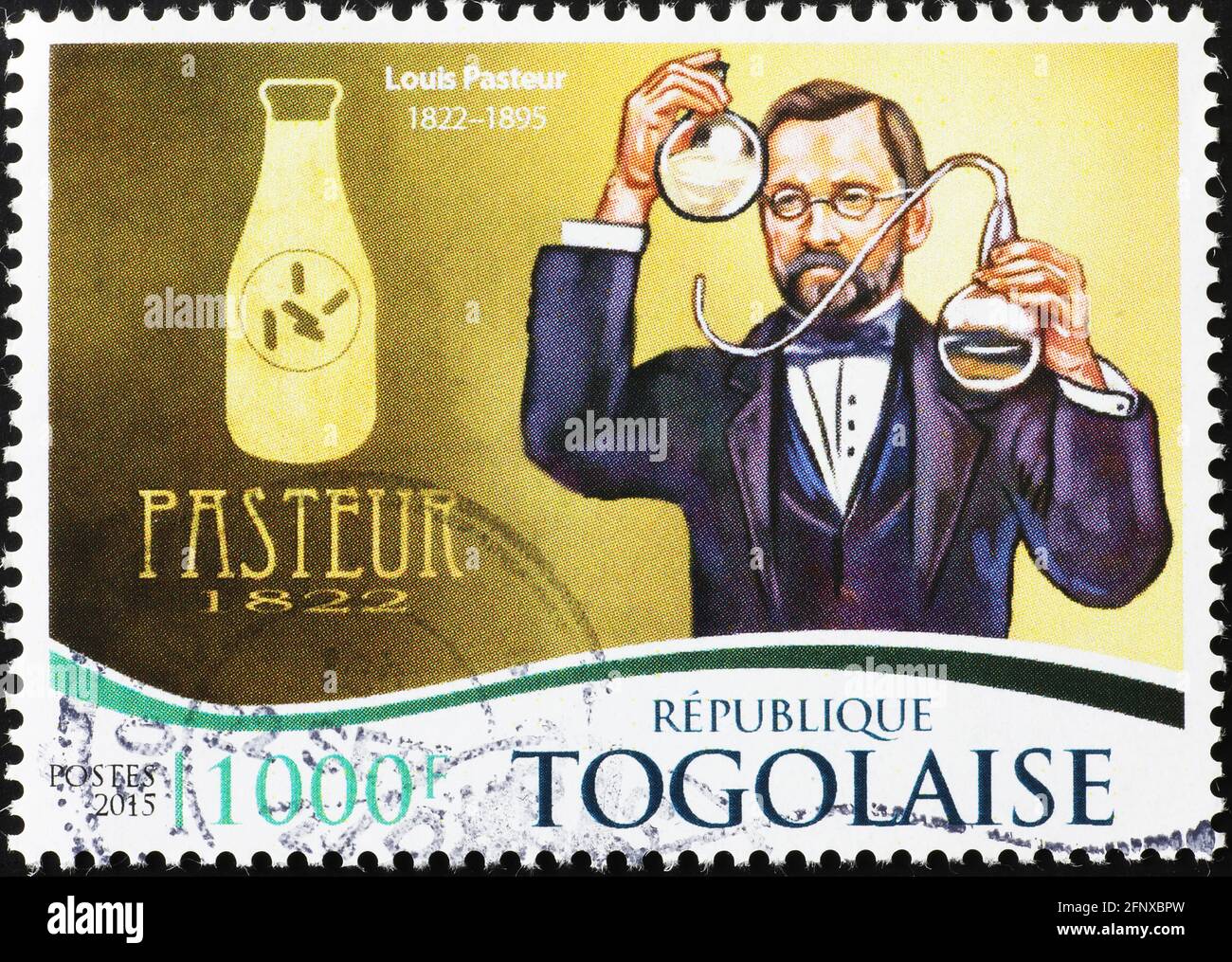 Louis Pasteur und eine Flasche Milch auf Briefmarke Stockfoto