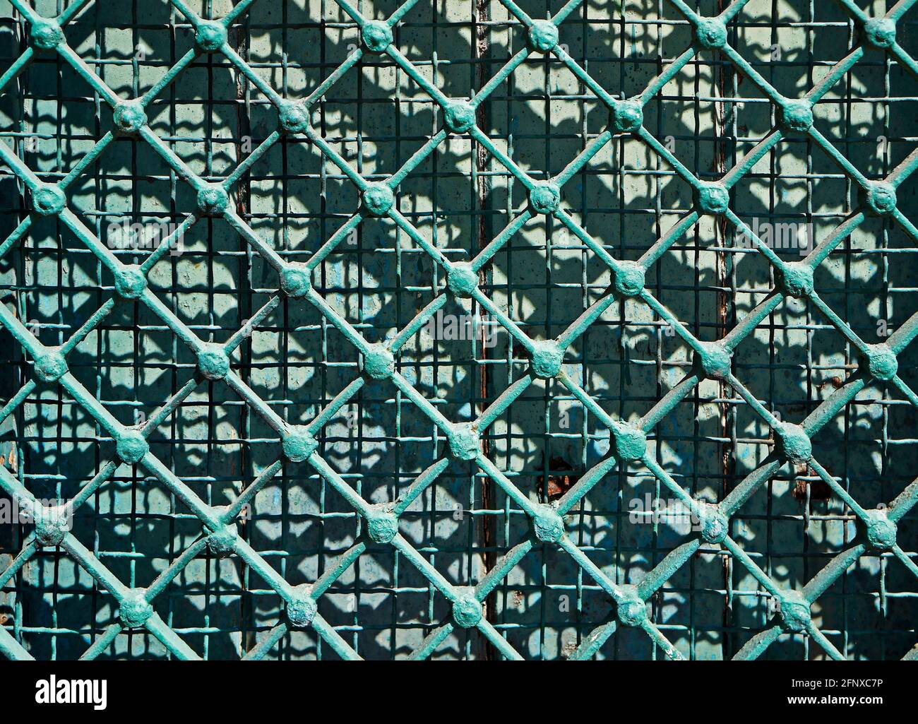 Hintergrund der grünen Gitterstruktur Stockfoto