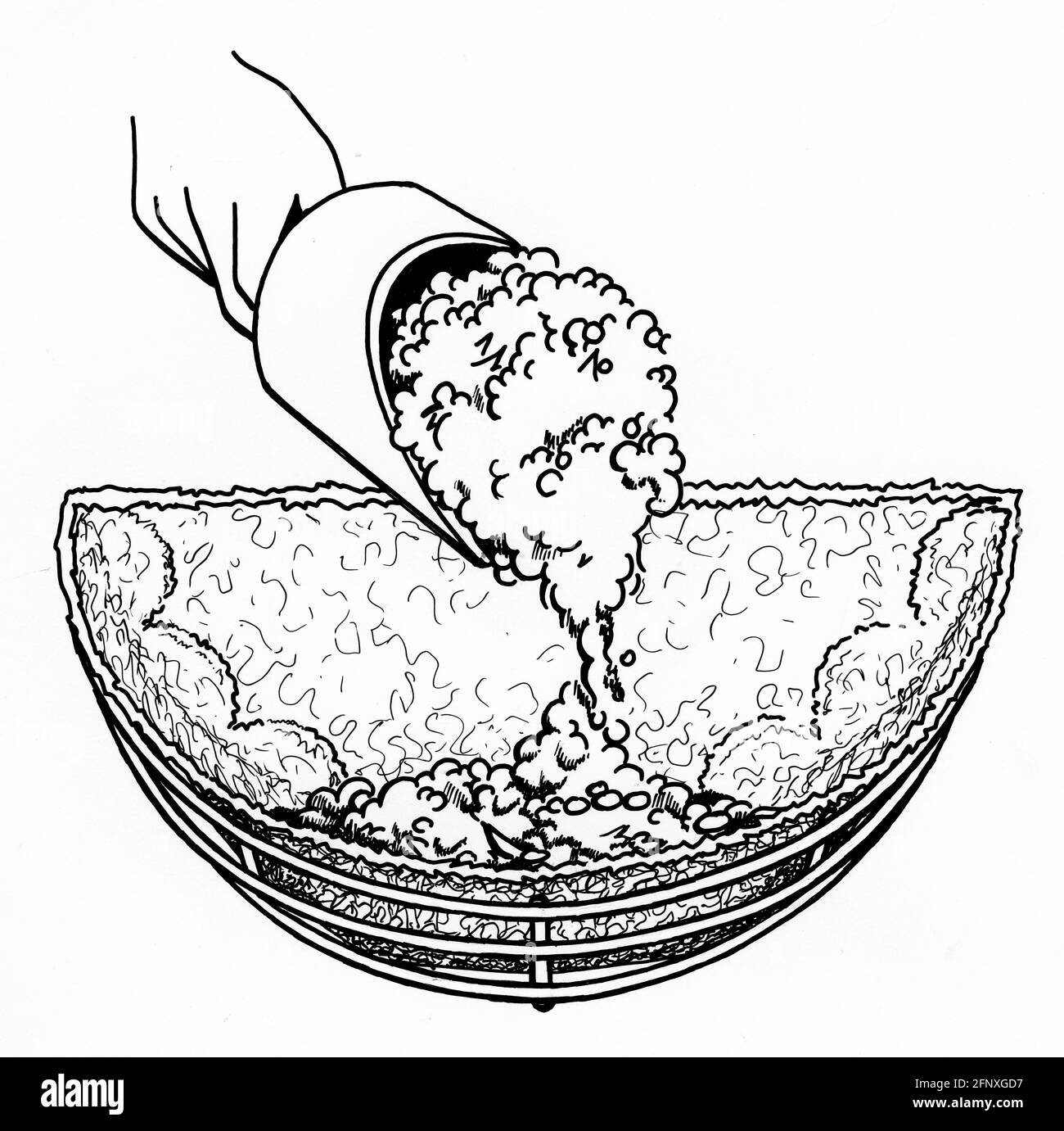 Die Zeichnung der Hand, die die eintopfende Mischung zu a hinzufügt Wandkorb mit einem Sphagnum-Moos-Liner Stockfoto