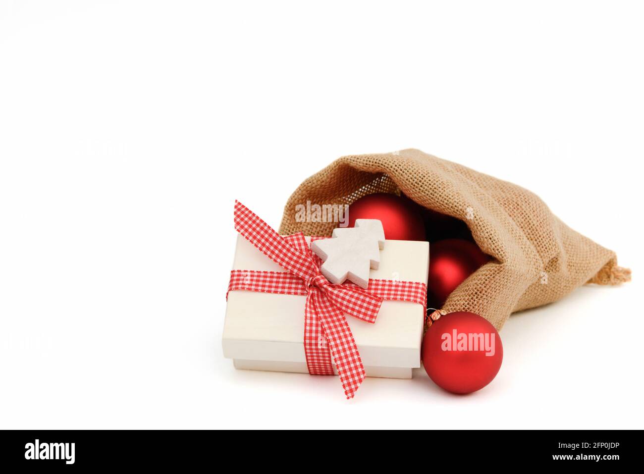 Weihnachtsgeschenk in santa Tasche Stockfoto