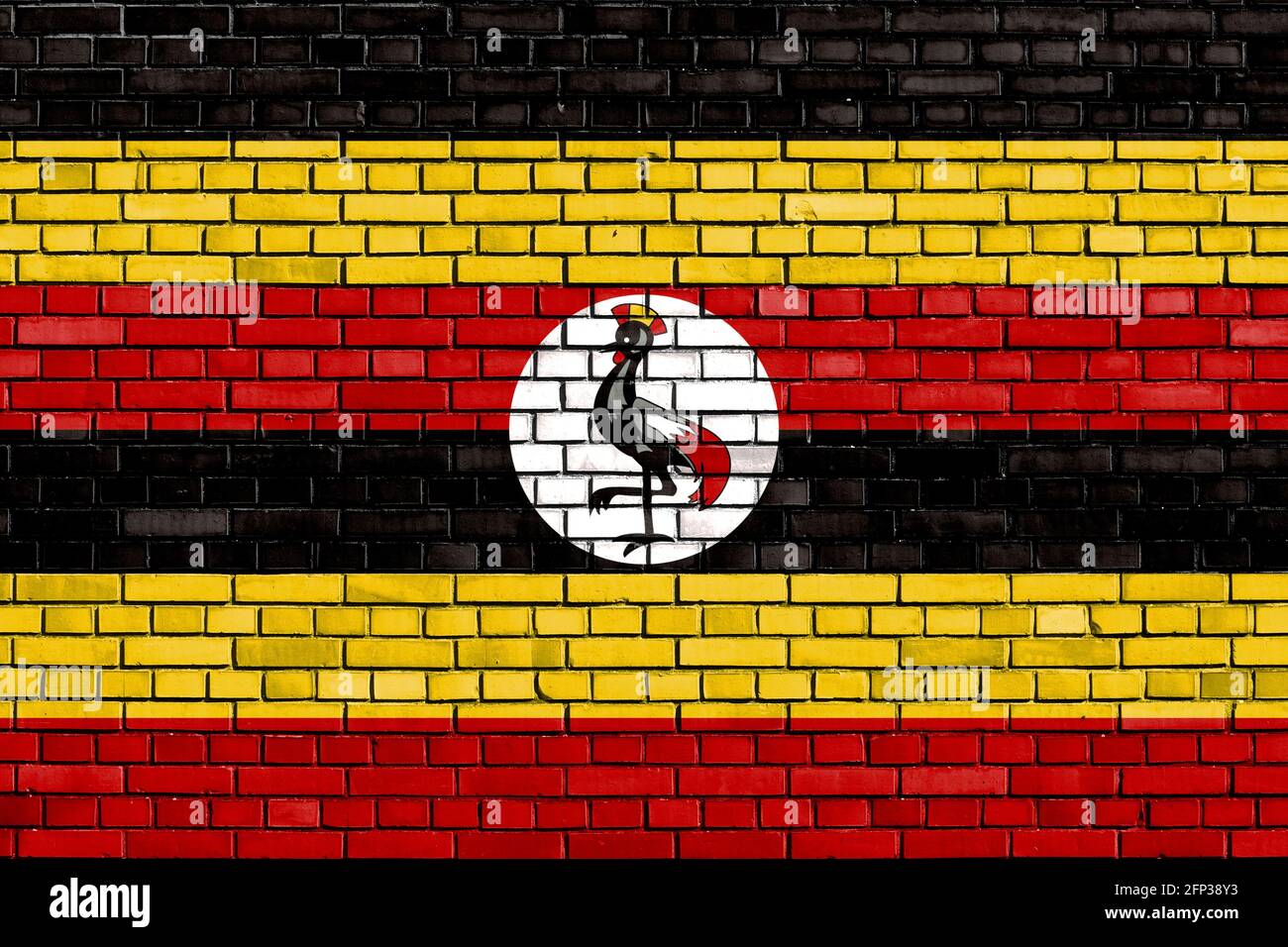 Flagge Ugandas auf Mauer gemalt Stockfoto