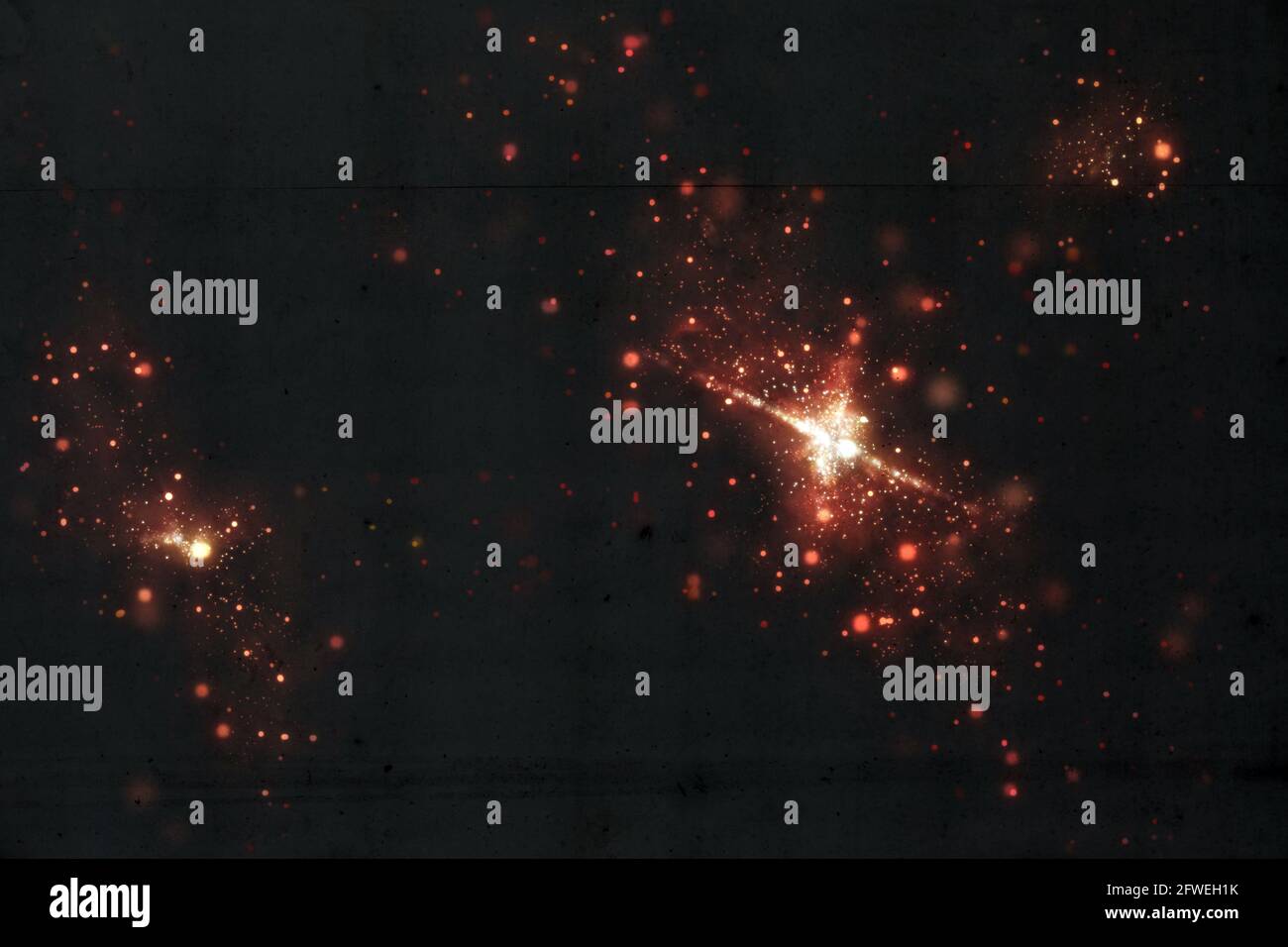 Hintergrund mit Sternen leuchtet orange und weiß Stockfoto