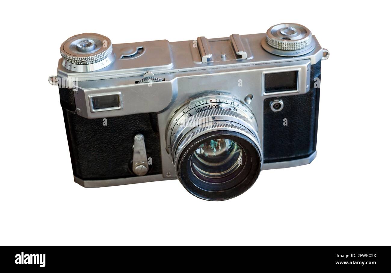 Alte Kamera auf weißem Hintergrund isoliert. Vintage-Filmkamera mit Retro-Objektiv Isolate. 19. Jahrhundert. Stockfoto