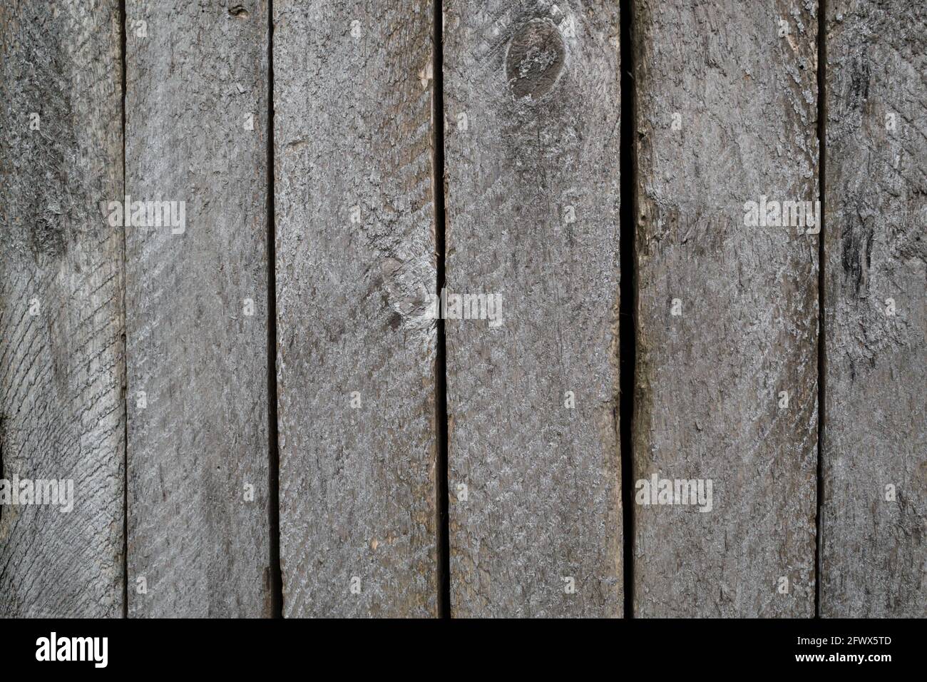 Holzhintergrund aus alten grauen Planken Stockfoto