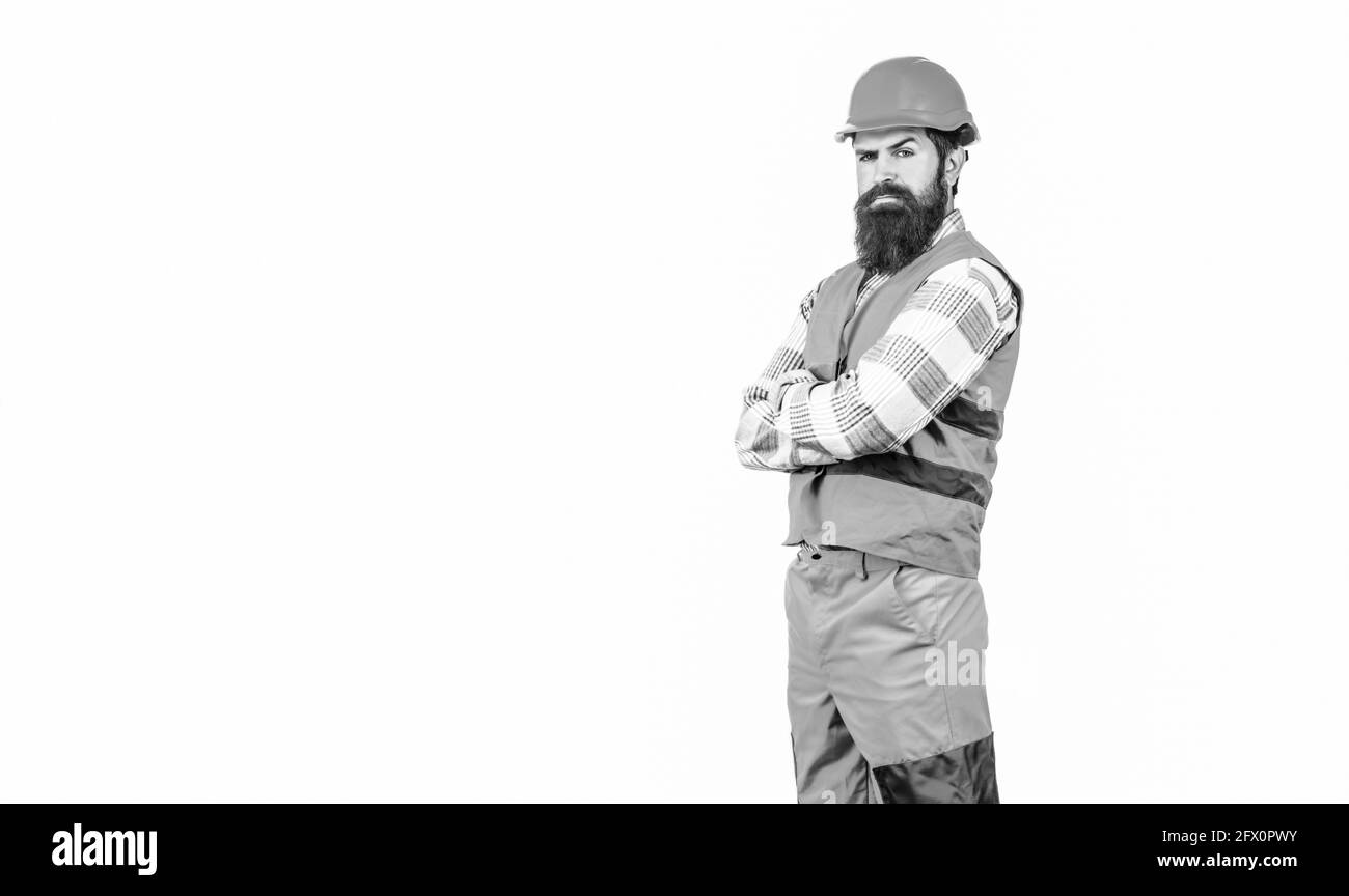 Baumeister, Industrie. Arbeiter in der Bauuniform. Architekt. Bärtiger Arbeiter mit Bart im Bau Helm oder Hut. Builder in Stockfoto