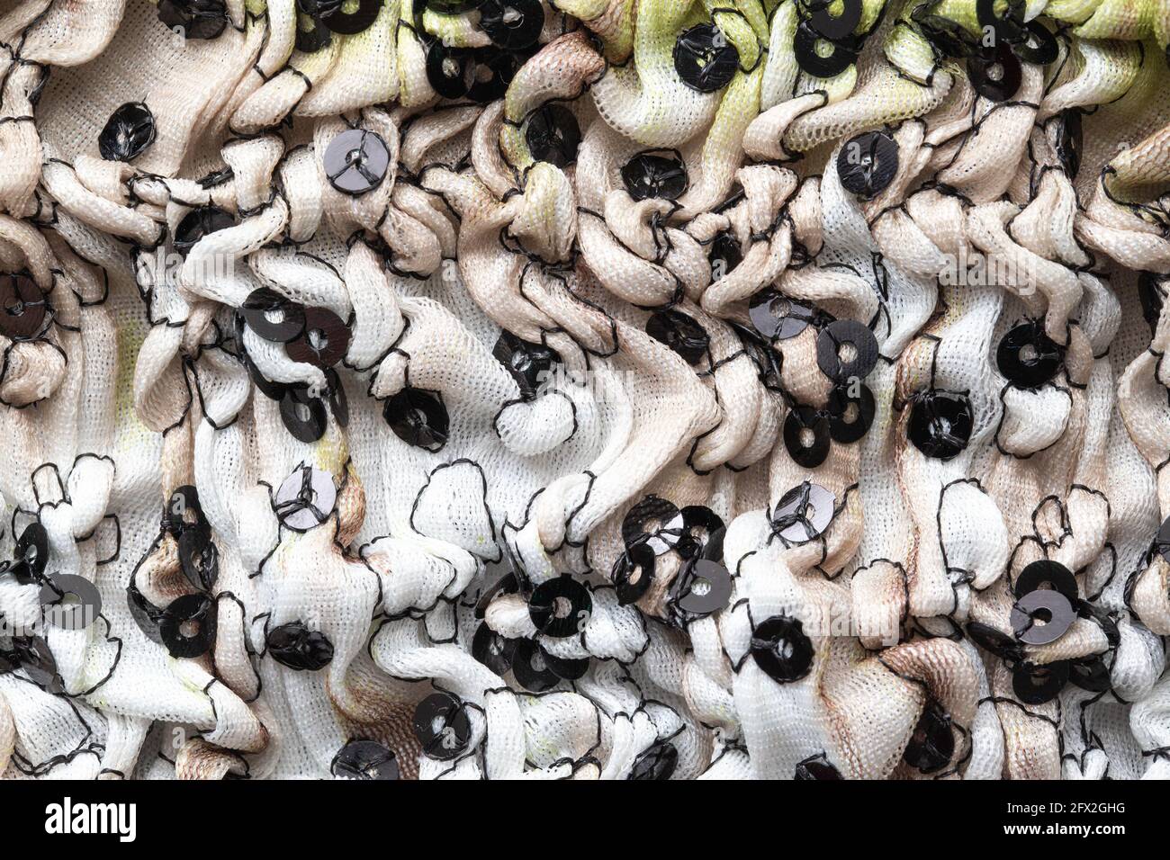 Graues Faltenmaterial, Hintergrund Makro Stockfoto