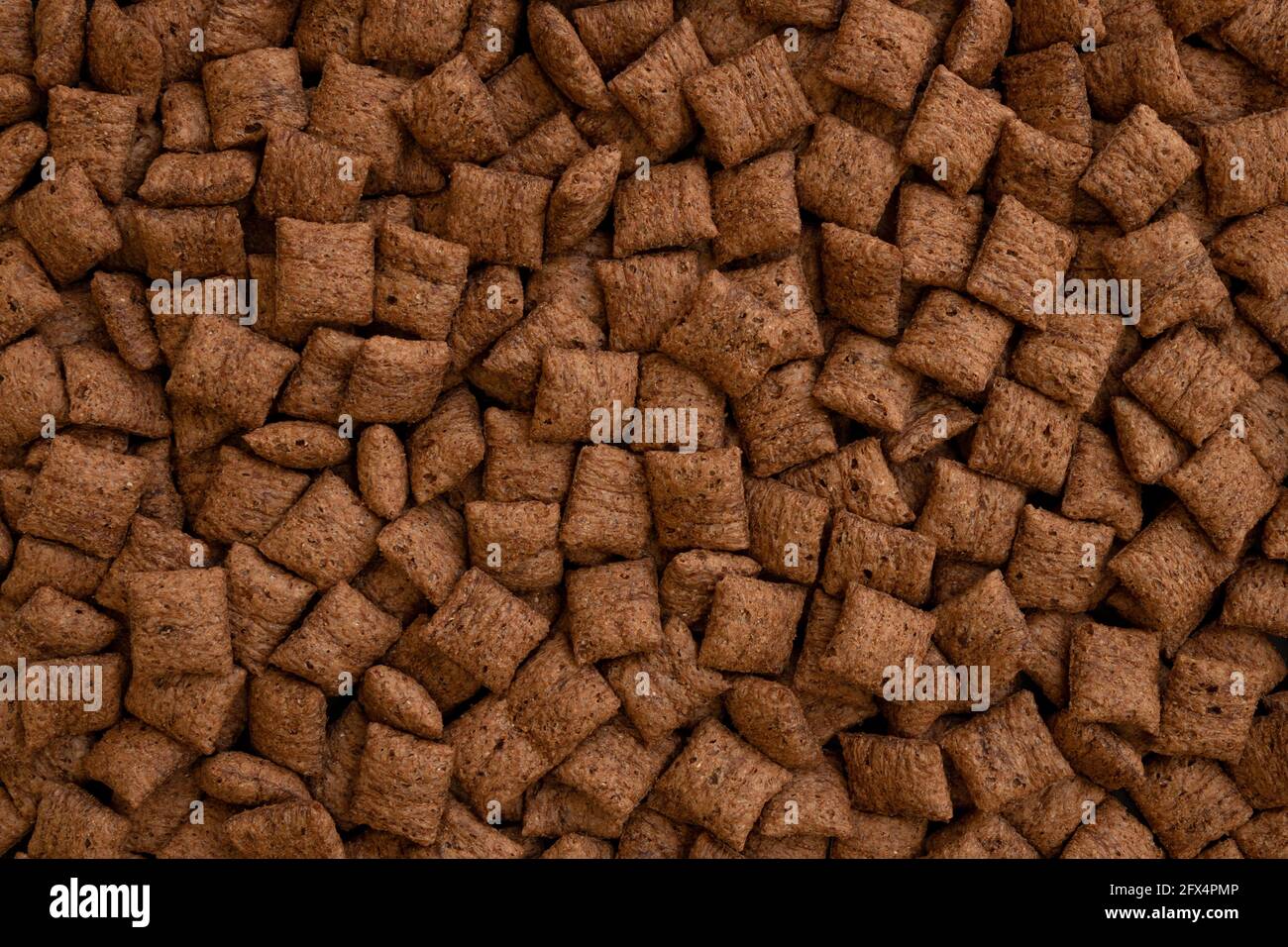 Schokolade Kissen Hintergrund Textur, braune Choco Müsli Pads Muster,  knusprige Cornflakes Tapete, gesunde süße Snack für Frühstück Mockup mit  Cop Stockfotografie - Alamy