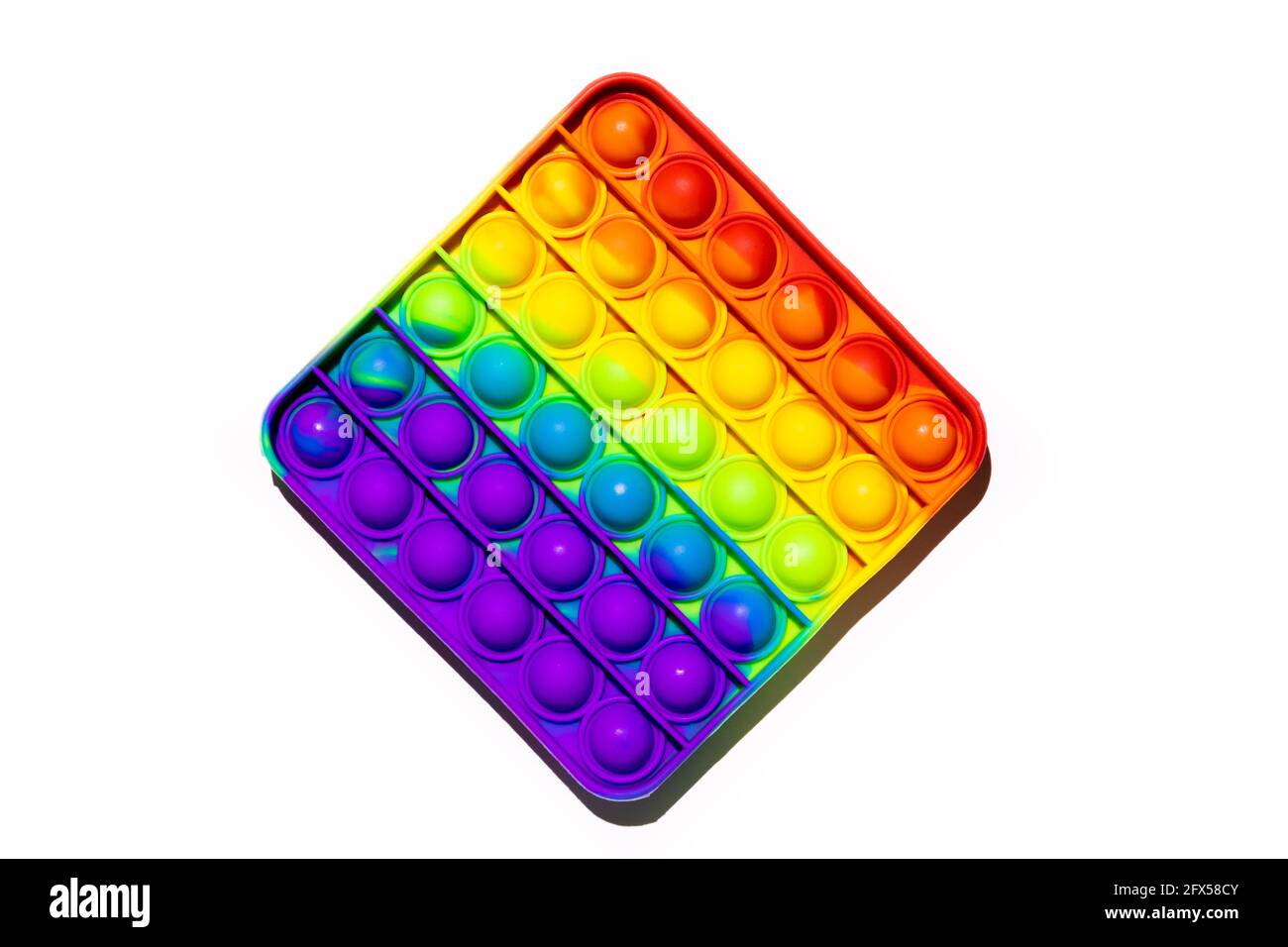 Pop IT Anti-Stress Fidget Spielzeug, bunte Regenbogen-Spiel isoliert weißen  Hintergrund Stockfotografie - Alamy