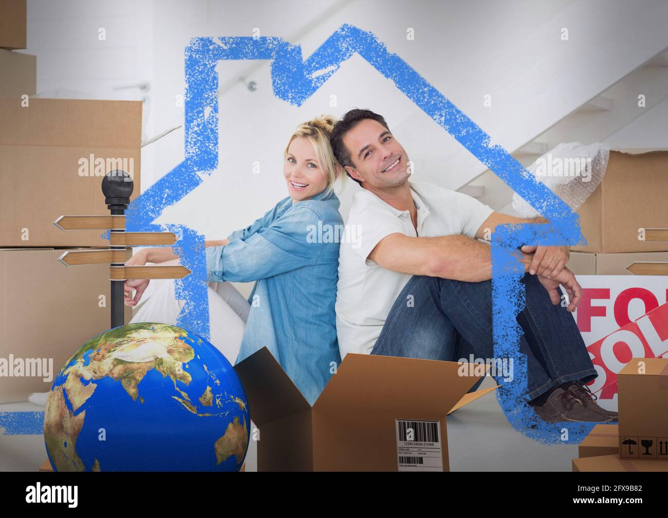 Komposition von House Icon über glückliches kaukasisches Paar neu Zuhause mit Globus und Kartons Stockfoto