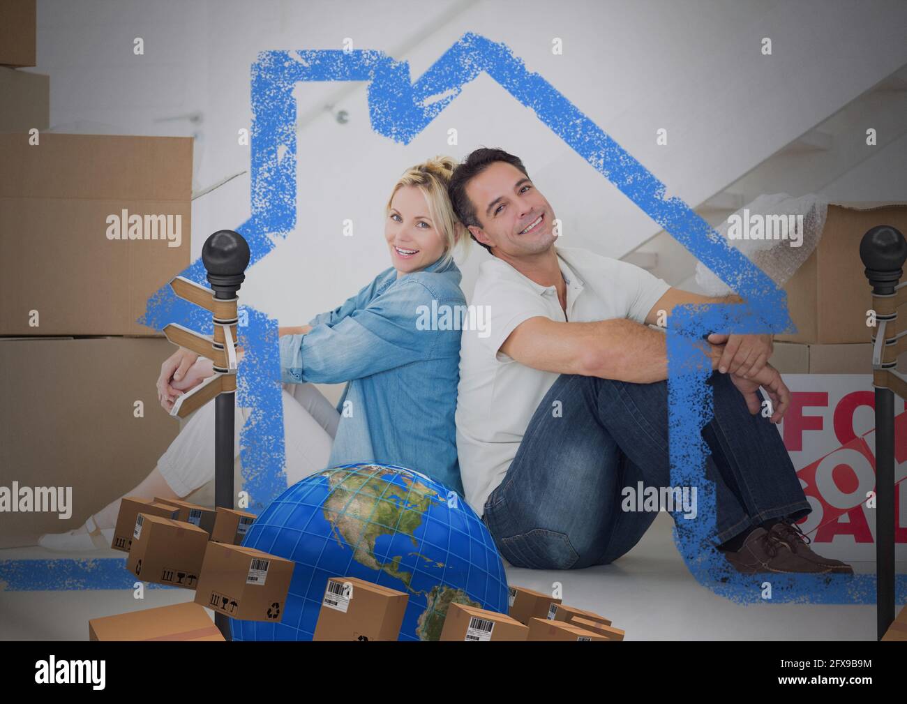 Komposition von House Icon über glückliches kaukasisches Paar neu Zuhause mit Globus und Kartons Stockfoto