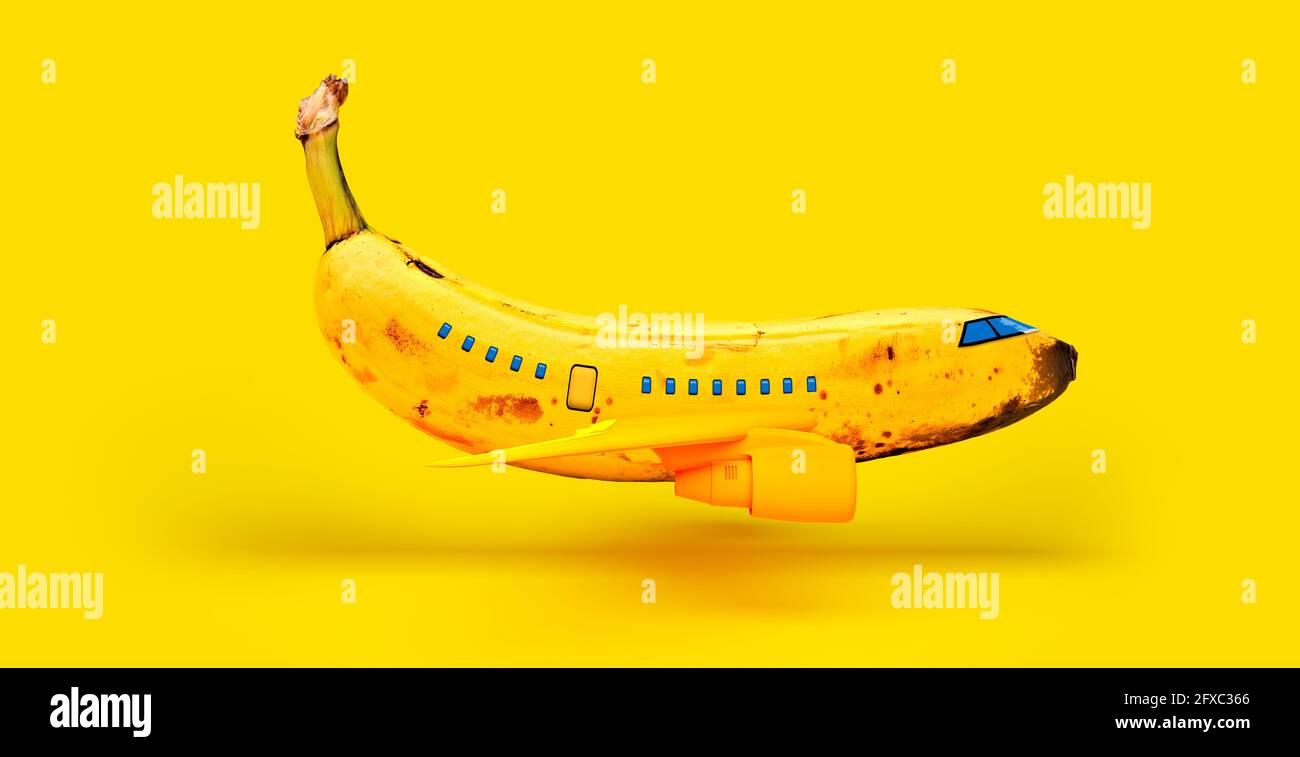 Banane, die das Flugzeug vor gelbem Hintergrund darstellt Stockfoto