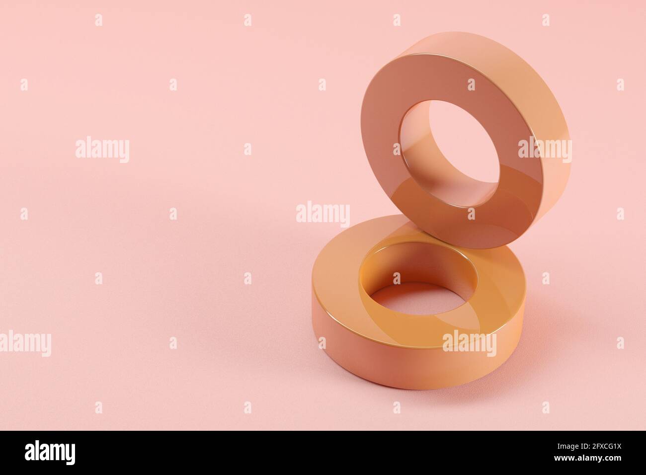 Dreidimensionales Rendern von zwei braunen glänzenden Ringen Stockfoto
