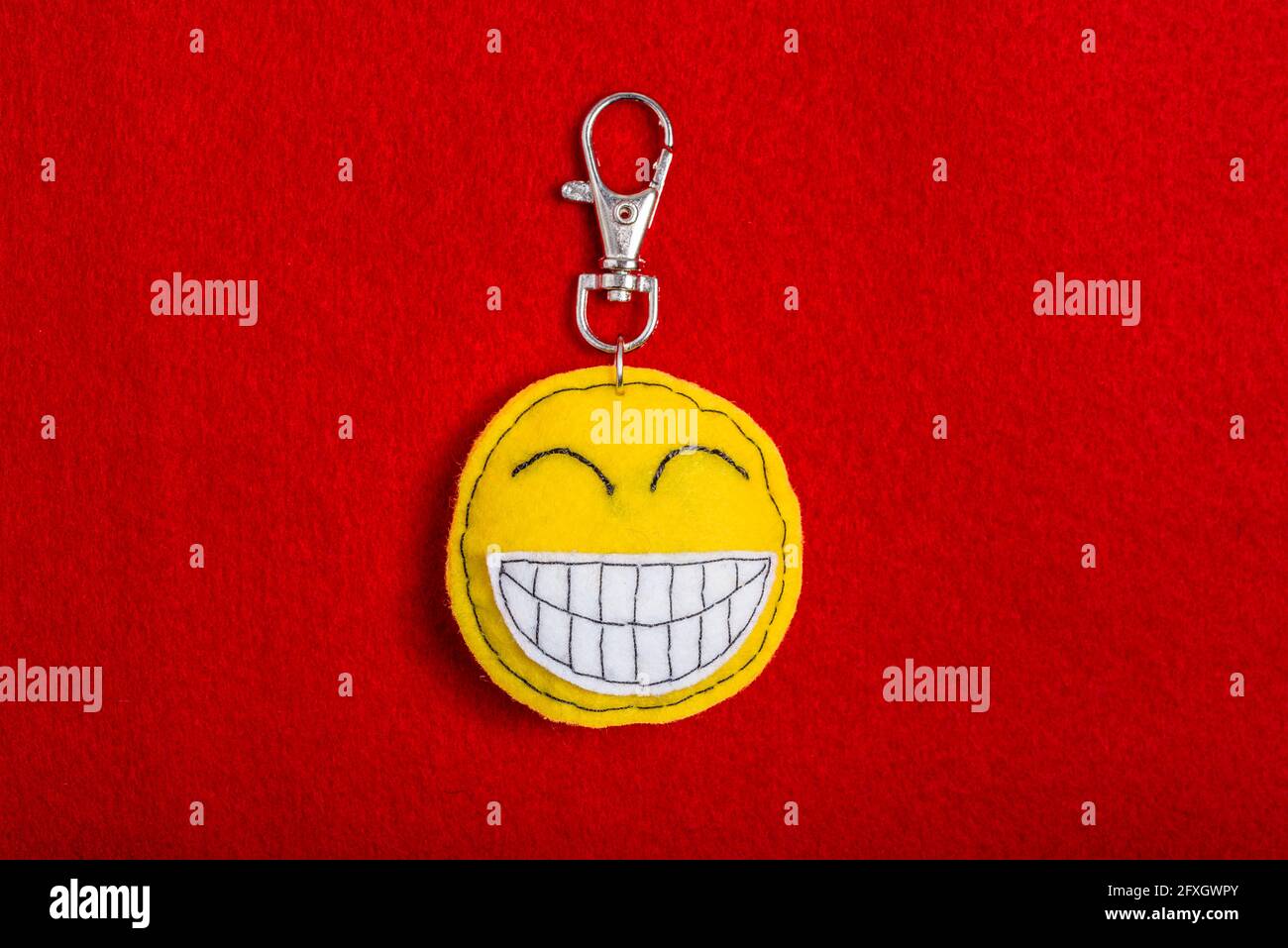 Happy Smiley Schlüsselanhänger - Emoticon Stockfoto