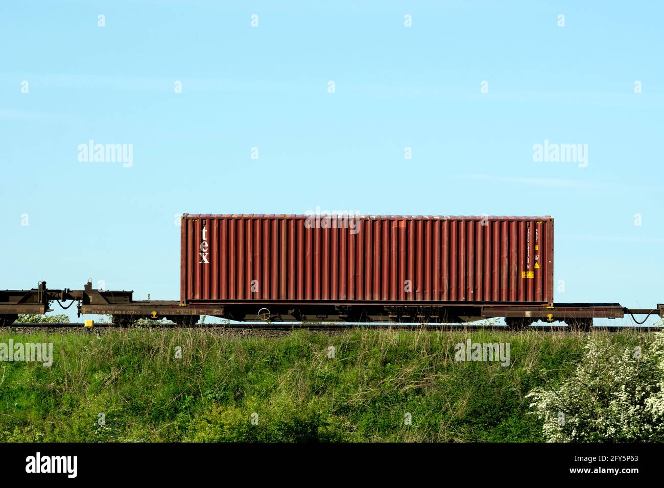 Tex-Transportcontainer in einem freightliner-Zug, Warwickshire, Großbritannien Stockfoto