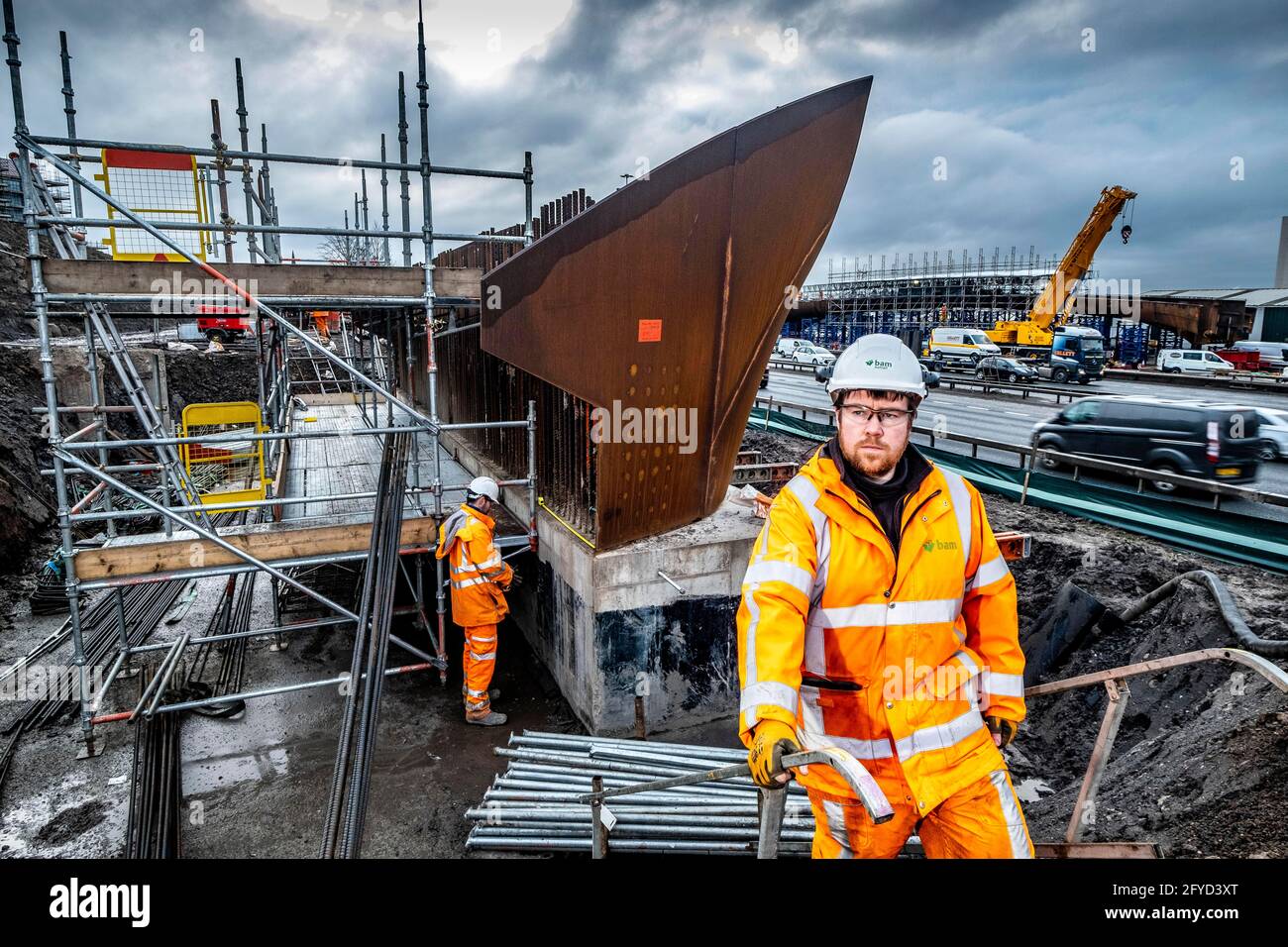 Bauarbeiter im Einsatz auf der Baustelle Stockfoto