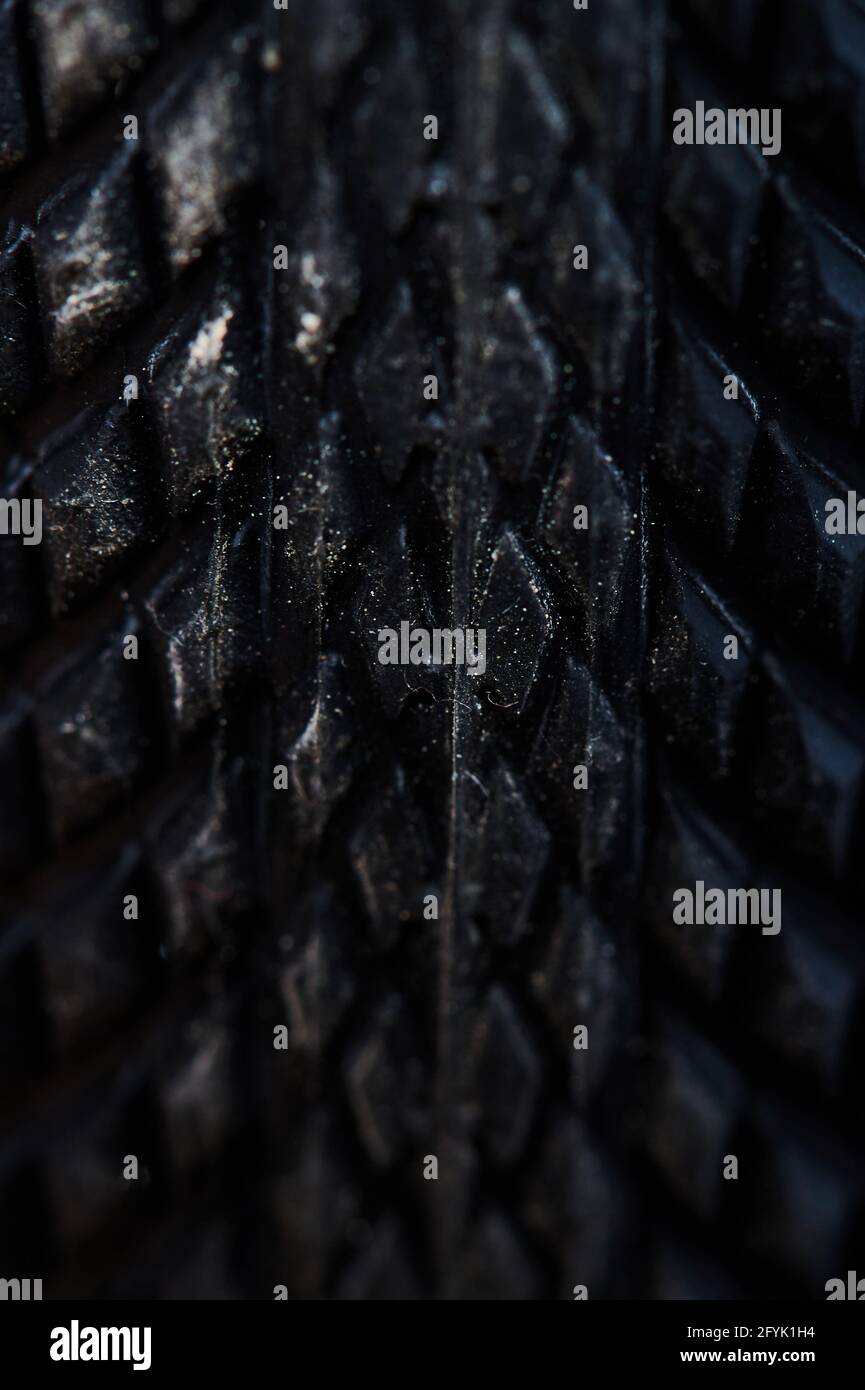 Oberfläche des schwarzen Fahrradreifen Makro-Nahaufnahme Stockfoto