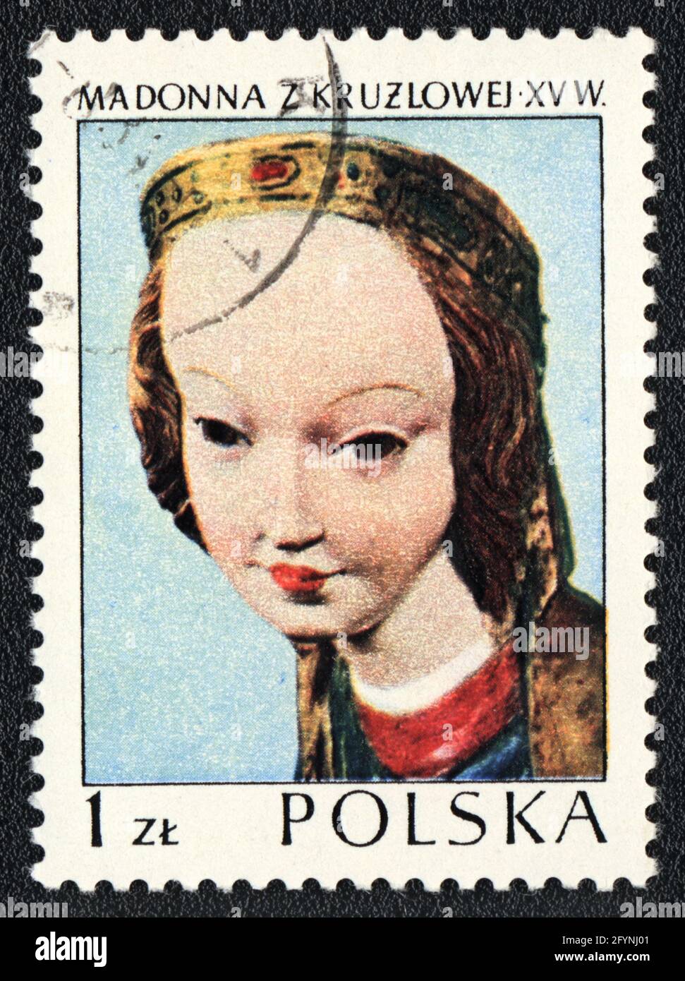 Briefmarke. Schöne Jungfrau Maria aus Krużlowa. Gotische Holzskulptur XV Stockfoto