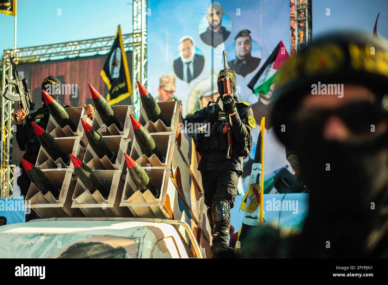 Kämpfer mit den Saraya al-Quds Brigaden, dem bewaffneten Flügel der Bewegung des Islamischen Dschihad in Palästina, in den Straßen von Gaza City während einer Kundgebung am 29. Mai 2021. Foto von Ramez Habboub/ABACAPRESS.COM Stockfoto