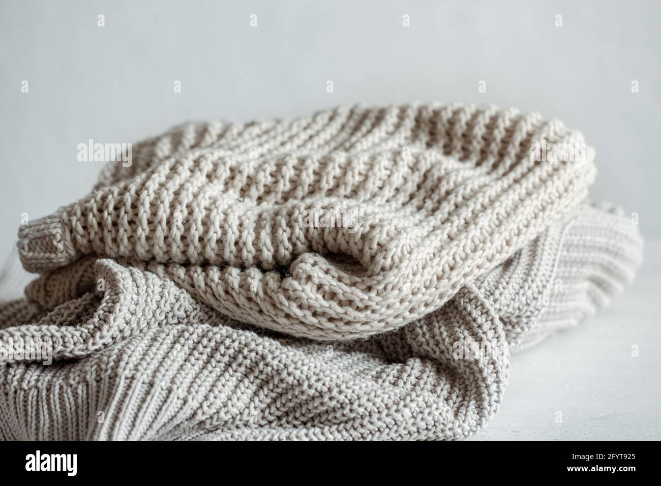 Nahaufnahme strukturierter Strickartikel Stockfoto