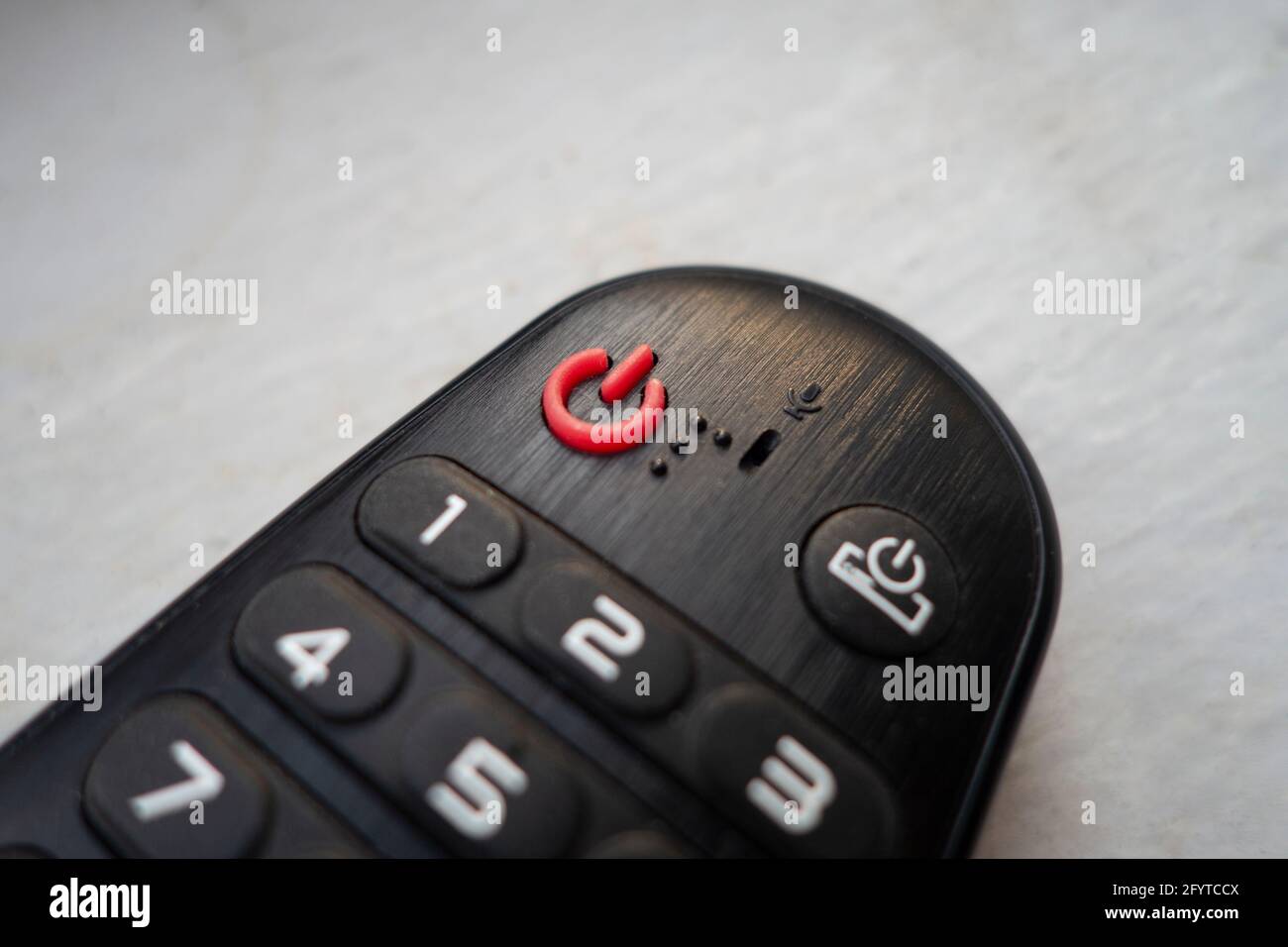Ein/aus-Taste für die Fernbedienung von Mulitimedia tv Stockfoto