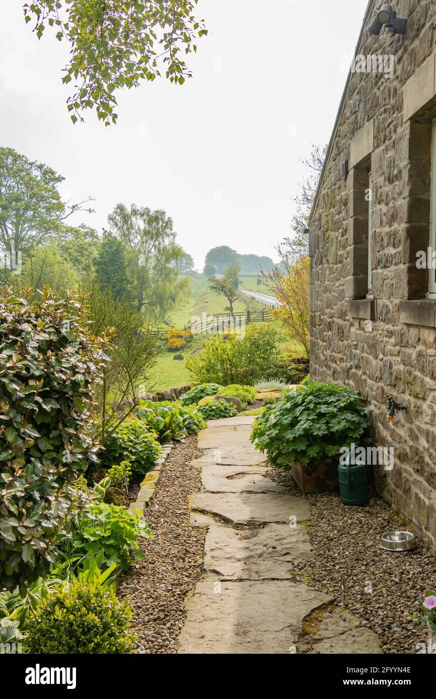 SCHÖNER GARTEN AUF der Farm ST OSWALD Hadrian's Wall Northumberland Stockfoto