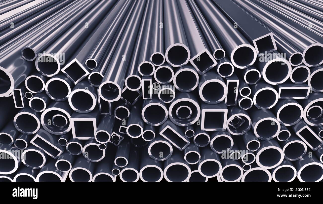 Stapel von silbernen Stahlrohren auf grauem Hintergrund. Metallurgisches Industriekonzept Stockfoto