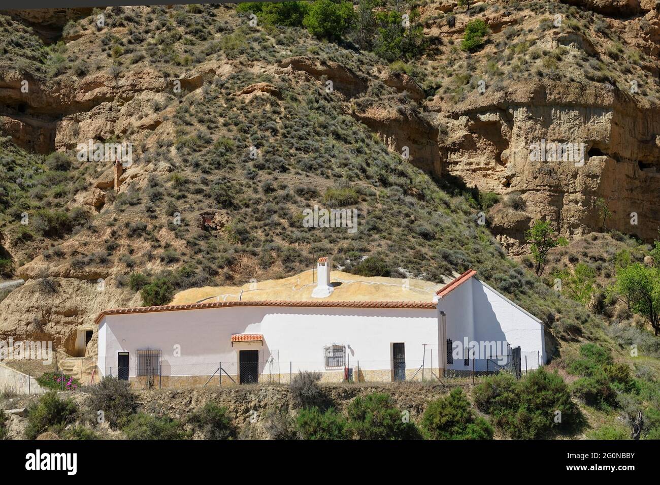 Cárcavas de Marchal (Spanien), Naturdenkmal Andalusiens: Höhlenhäuser sind Wohnungen, die in den Ausläufern der Badlands ausgegraben wurden Stockfoto