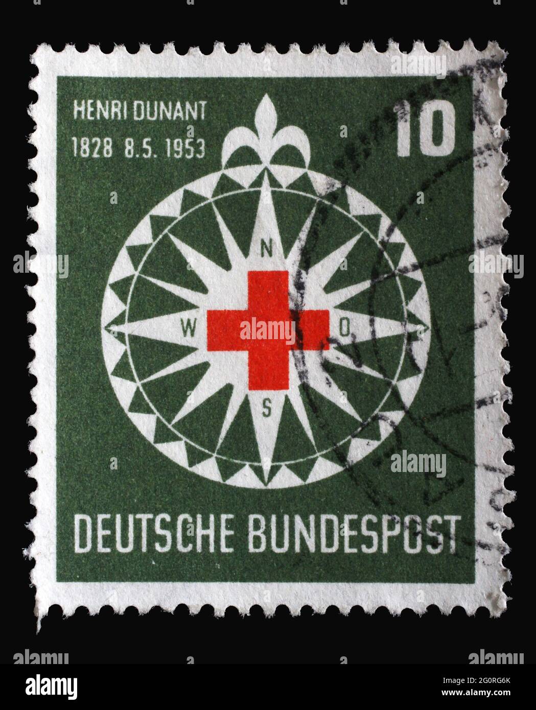 Stempel gedruckt in Deutschland, zeigt Symbol des Roten Kreuzes in einer stilisierten Windrose, um 1953 Stockfoto